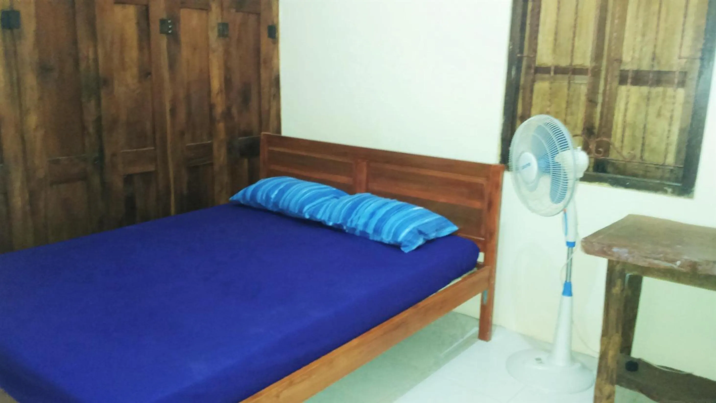 Bed in Griya Harja Homestay