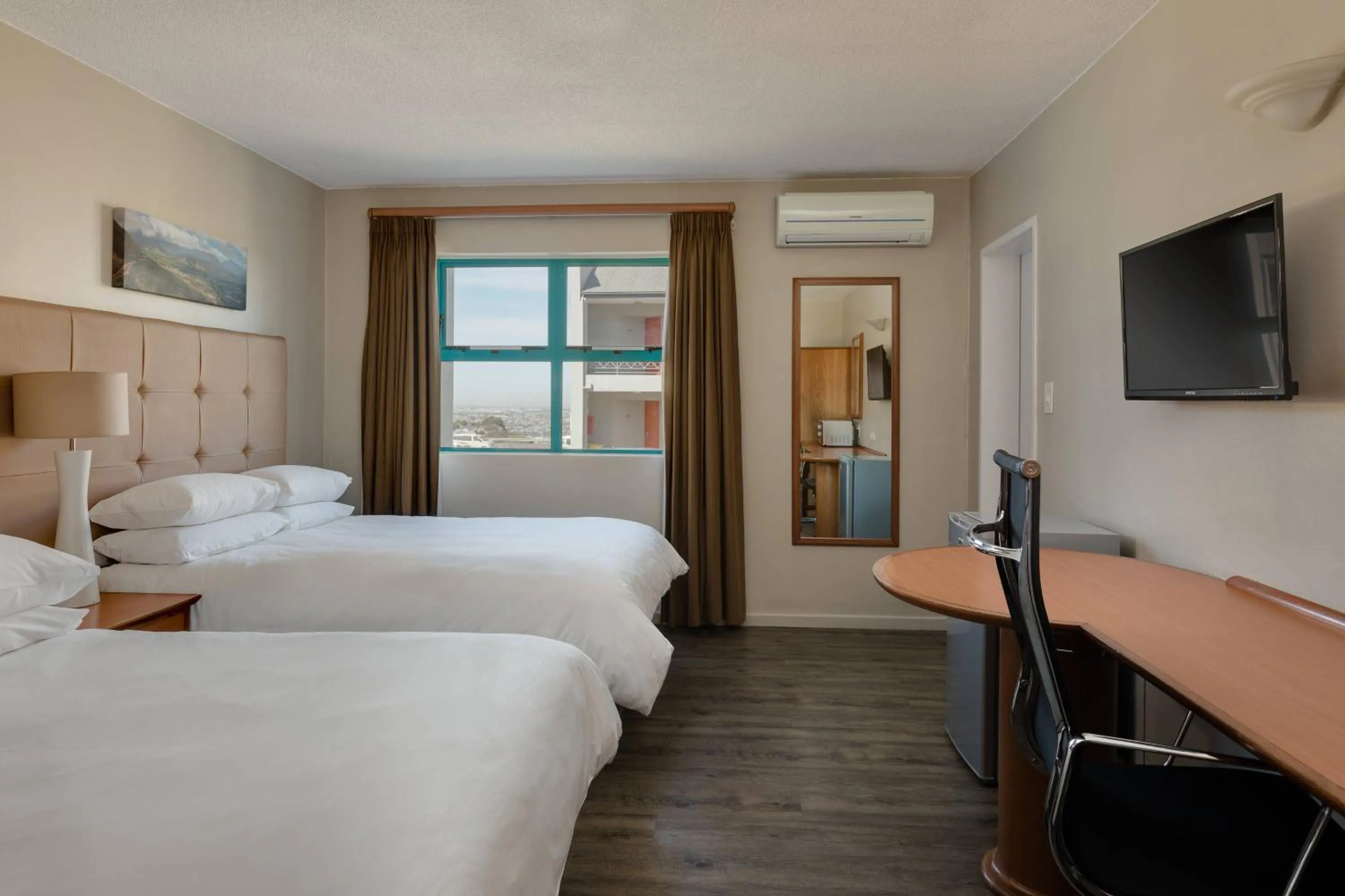 Photo of the whole room, Bed in Protea Hotel by Marriott Cape Town Tyger Valley