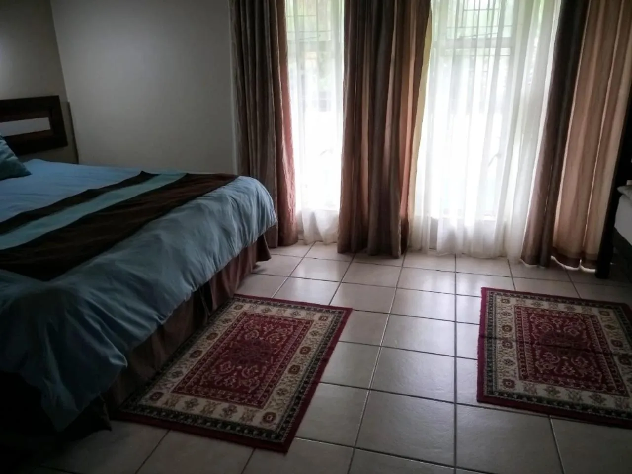 Bed in Rustenburg Guesthouse