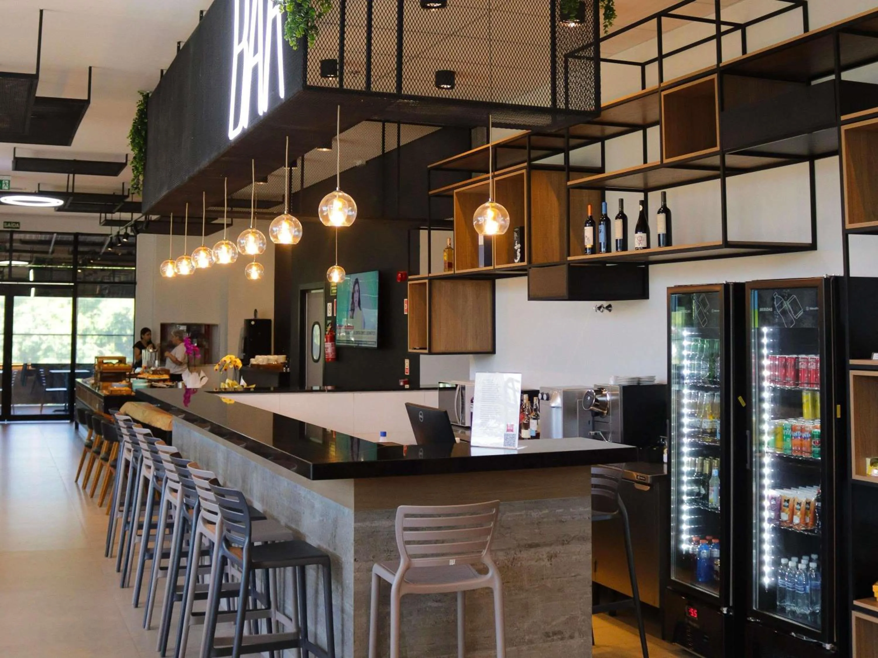 Lounge or bar in ibis Primavera do Leste