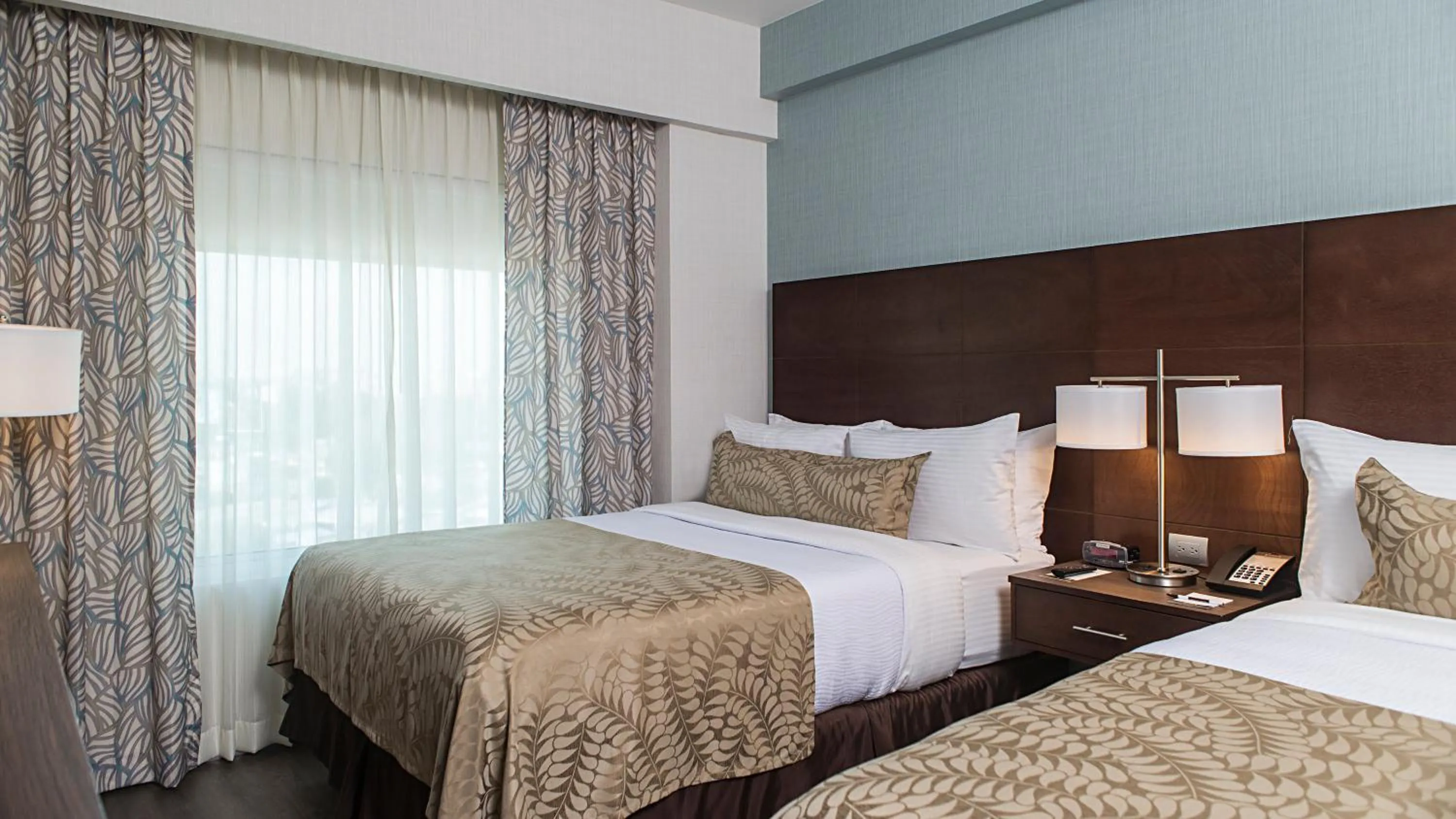 Photo of the whole room, Bed in Staybridge Suites Puebla by IHG