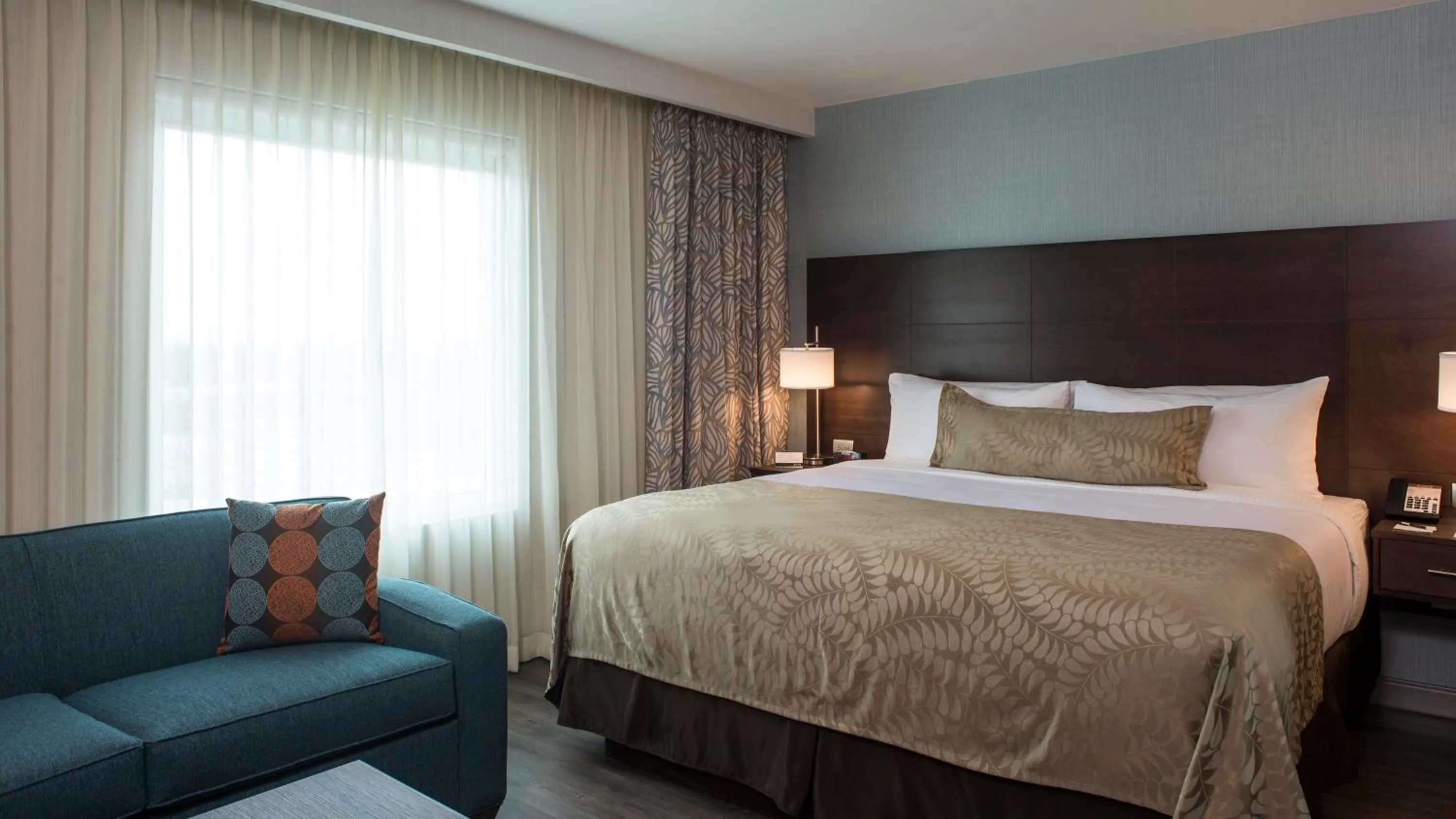 Photo of the whole room, Bed in Staybridge Suites Puebla by IHG