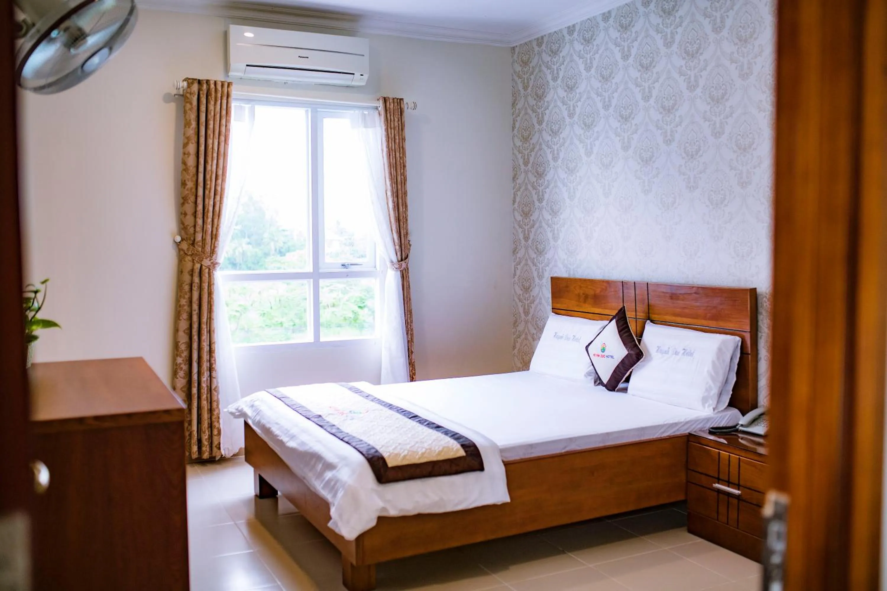 Bed in Huynh Duc Hotel