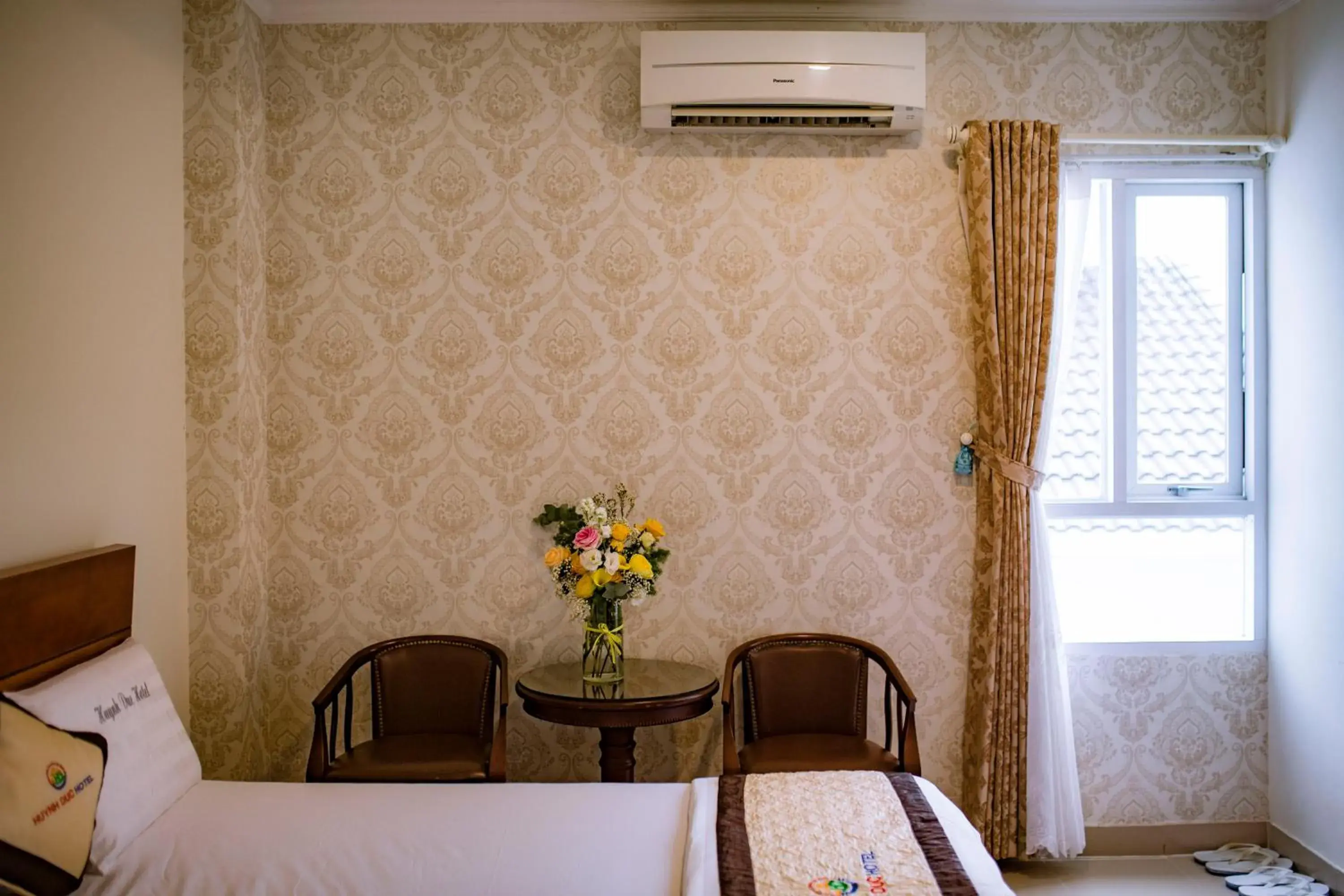 Bed in Huynh Duc Hotel Bed in Huynh Duc Hotel