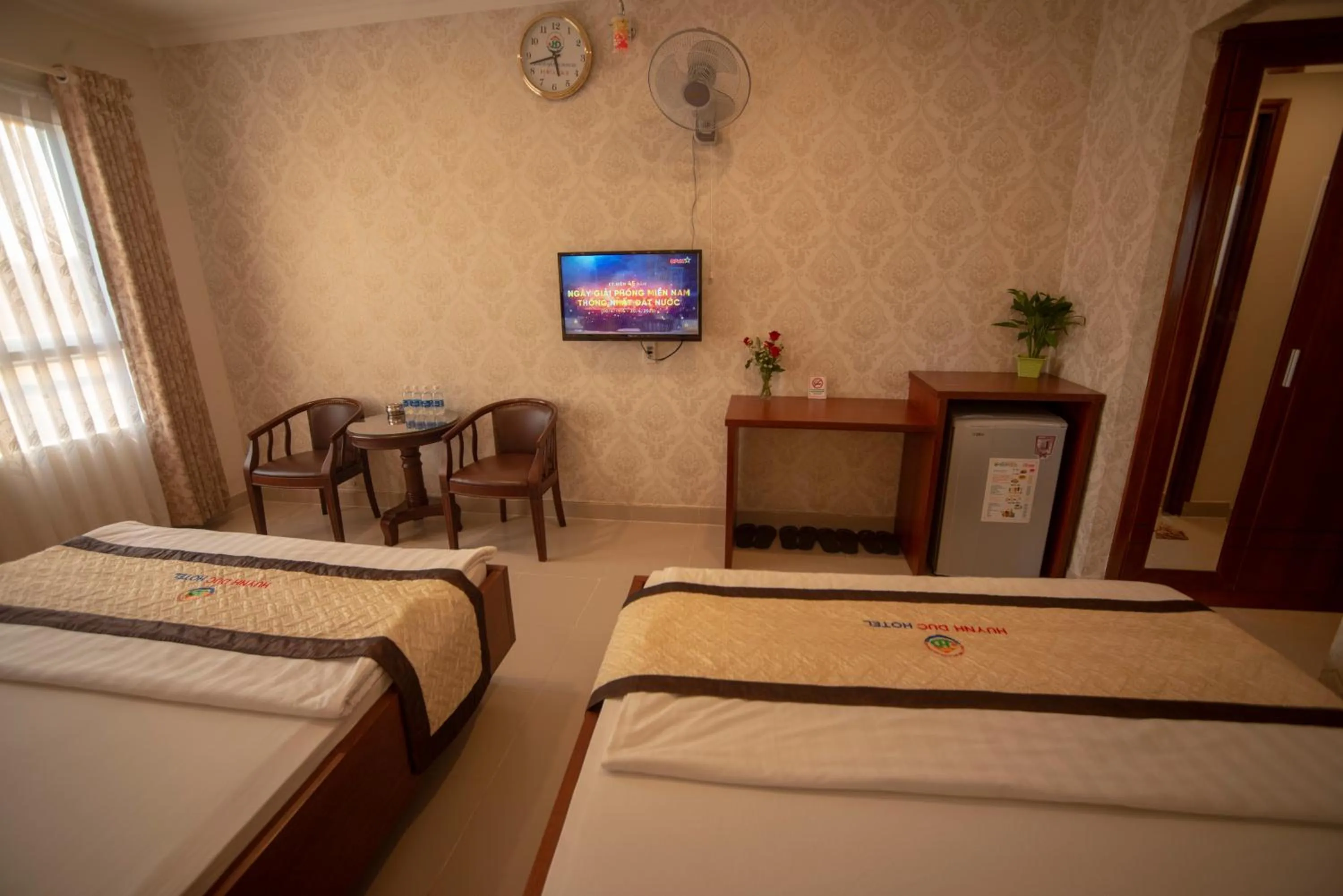 Bed in Huynh Duc Hotel