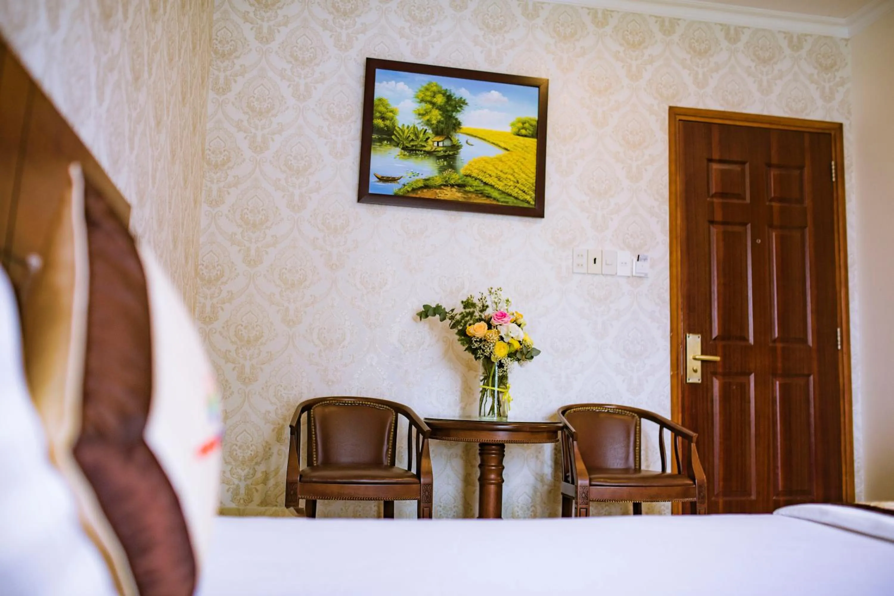 Bed in Huynh Duc Hotel