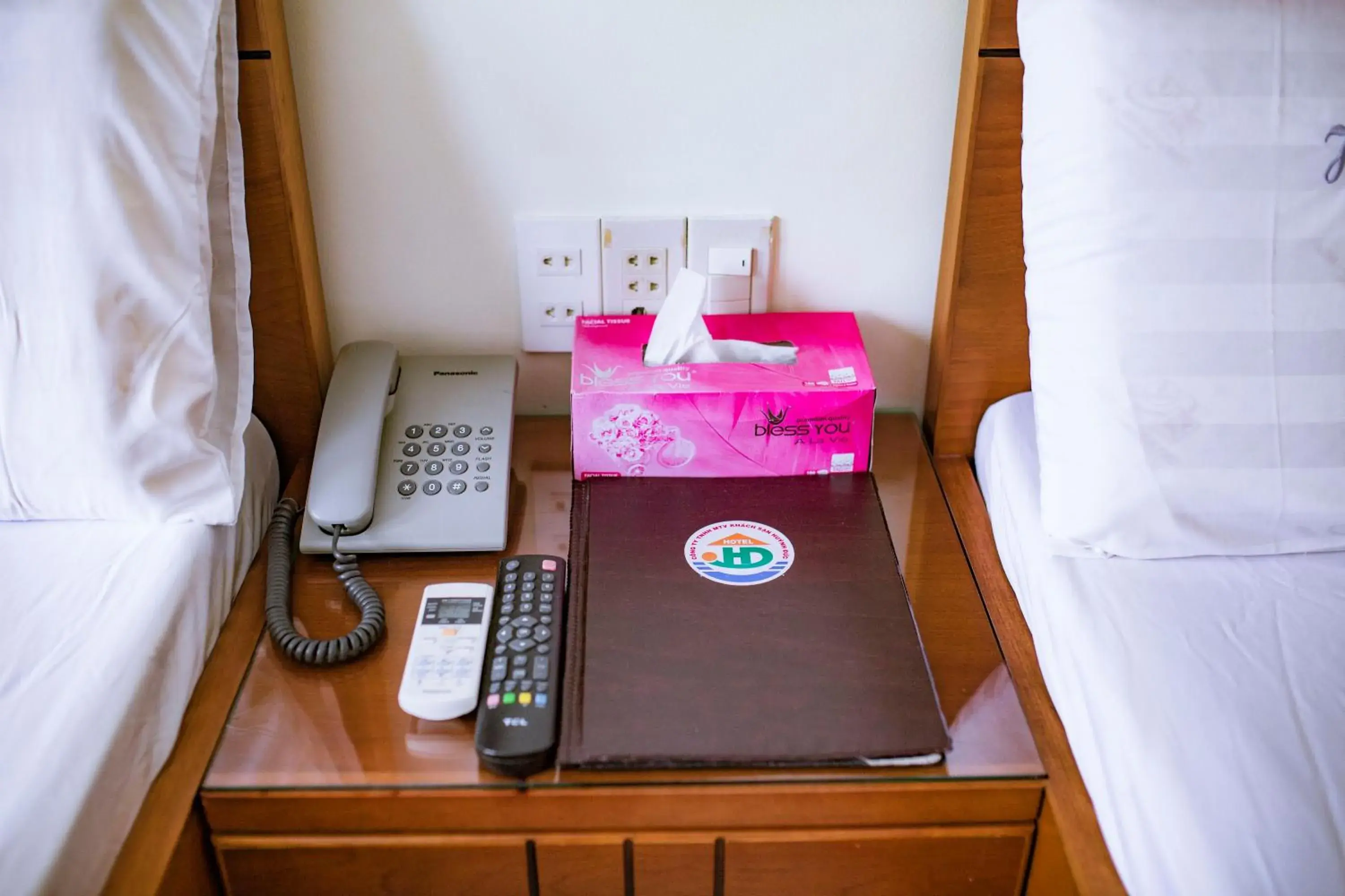 Bed in Huynh Duc Hotel Bed in Huynh Duc Hotel