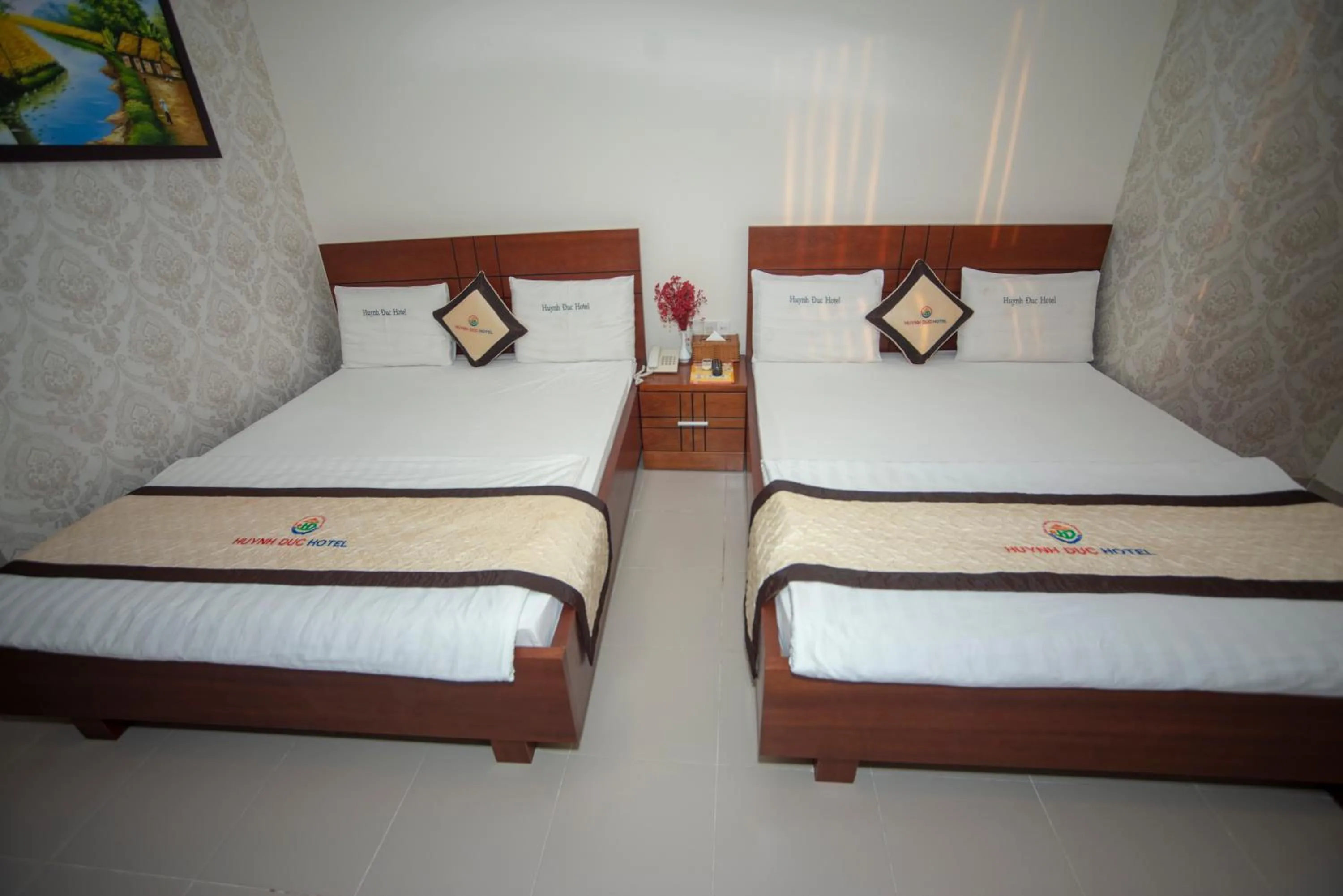 Bed in Huynh Duc Hotel