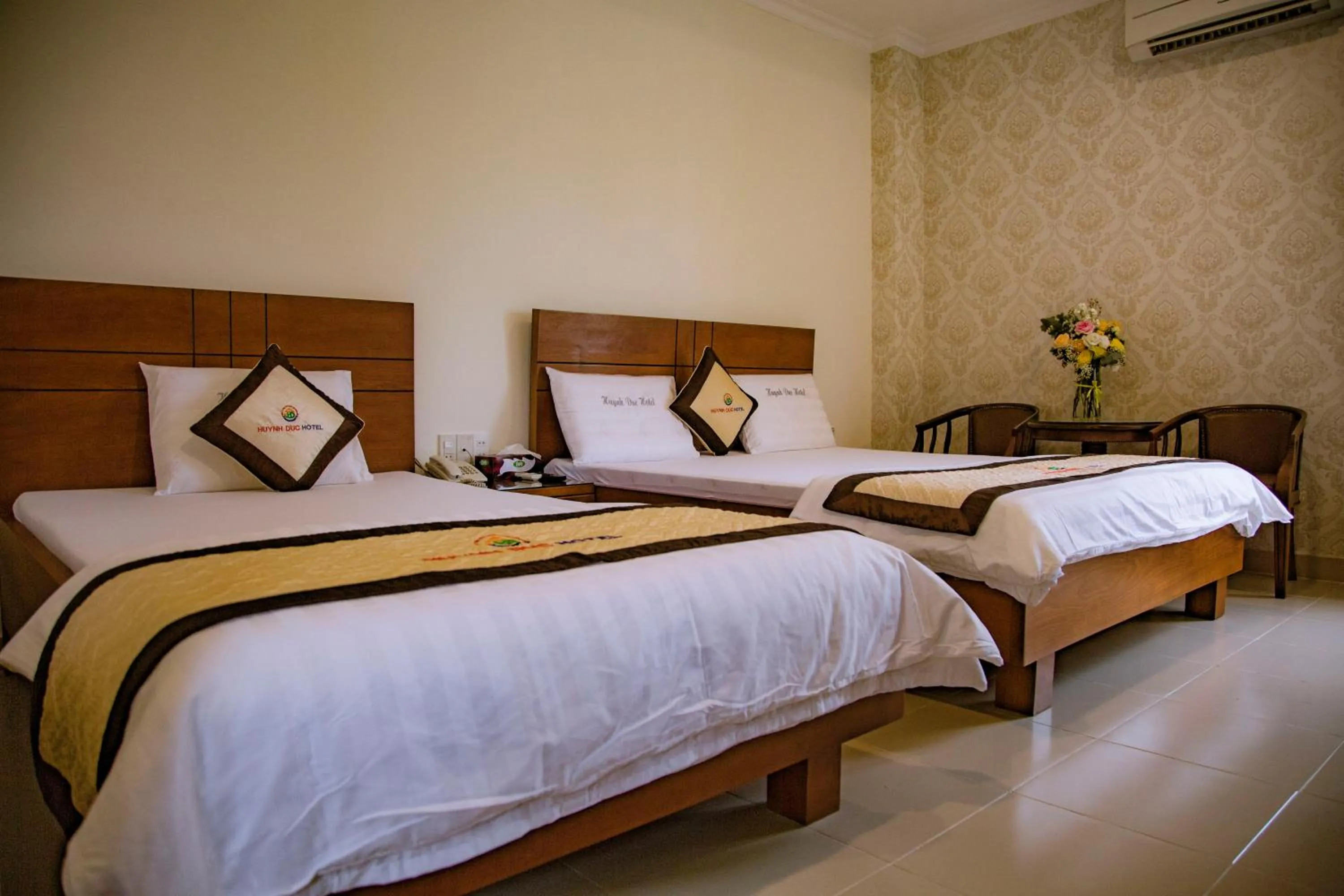 Bed in Huynh Duc Hotel