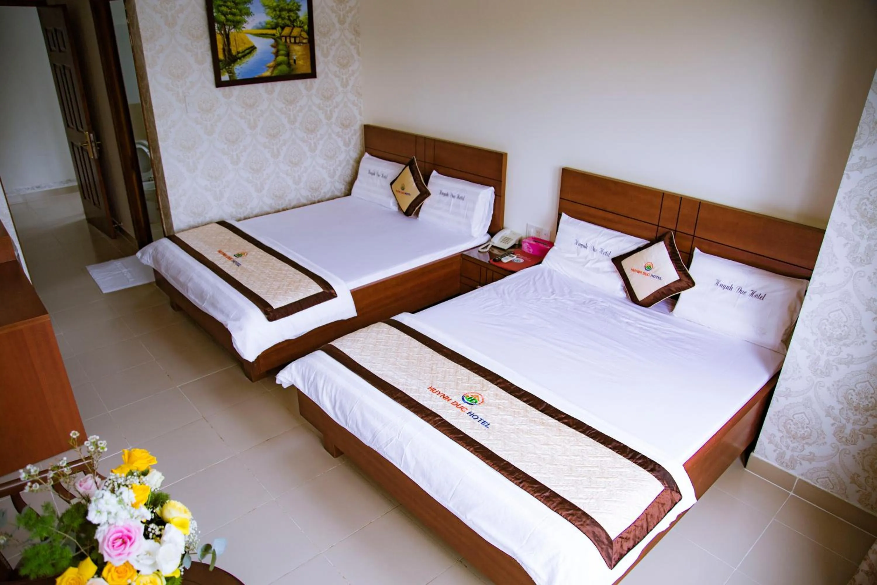 Bed in Huynh Duc Hotel