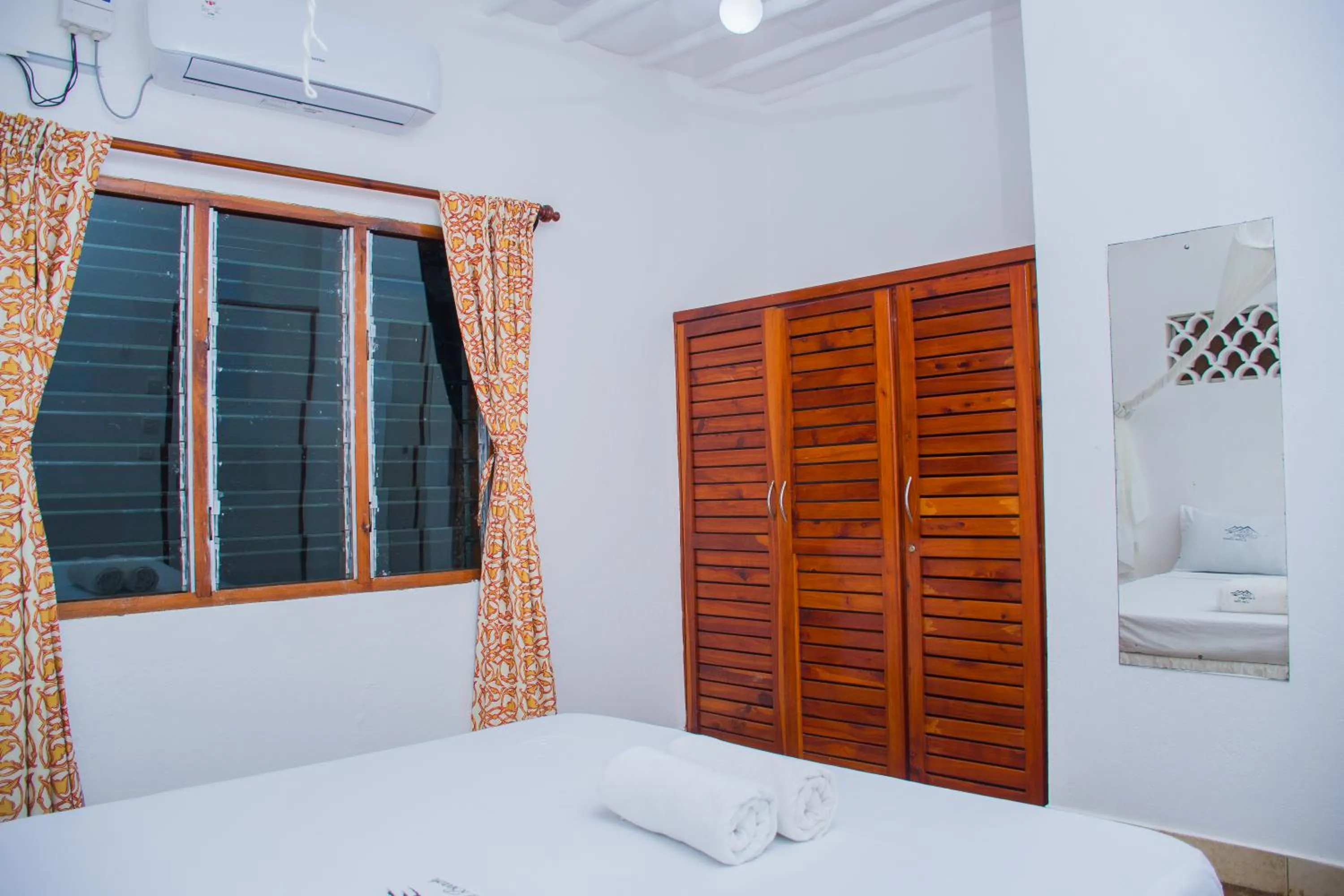 wardrobe, Bed in Doric Cottages Diani