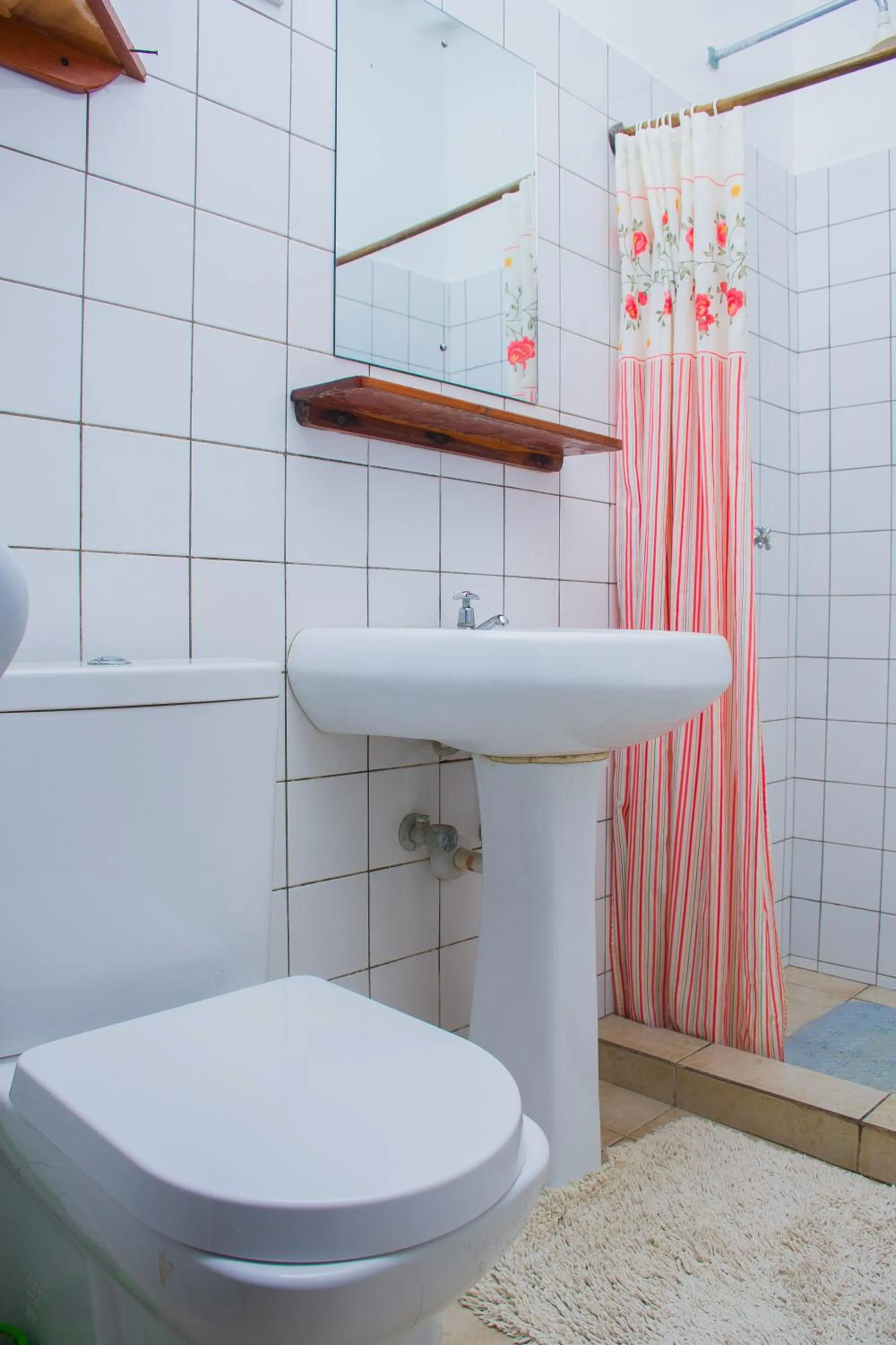 Bathroom in Doric Cottages Diani