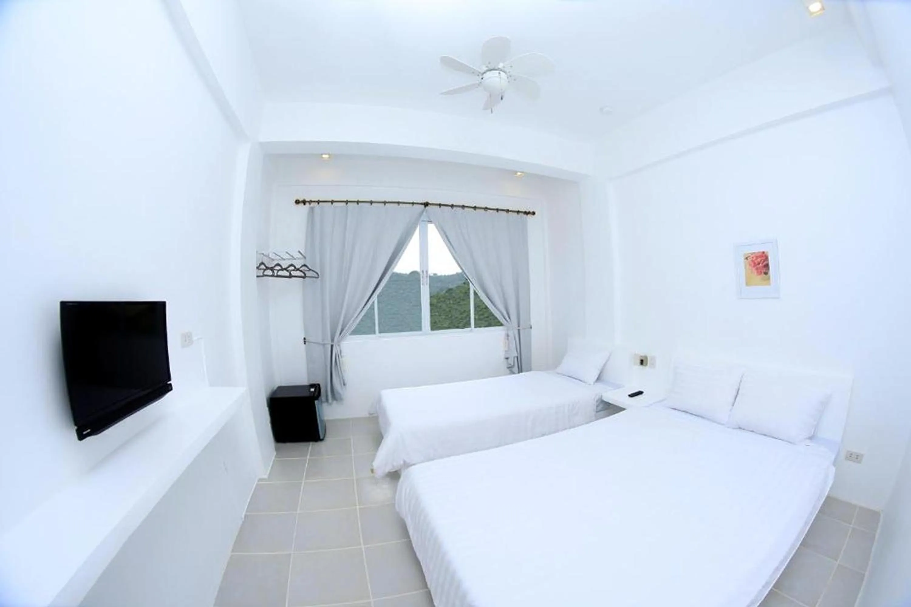 Bed in Coron Bluewave Hotel