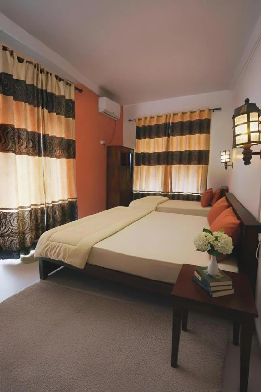Bed in Windy's Leisure Villa