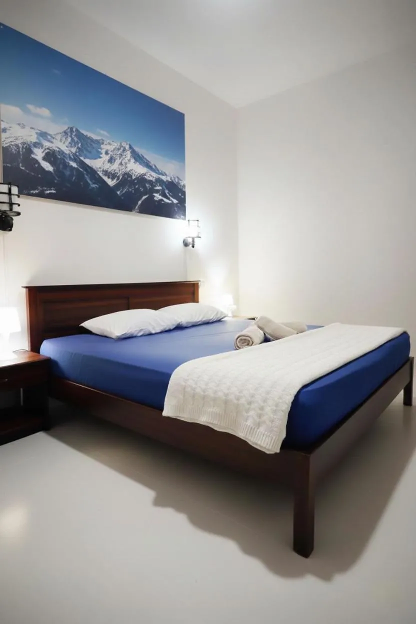 Bed in Windy's Leisure Villa