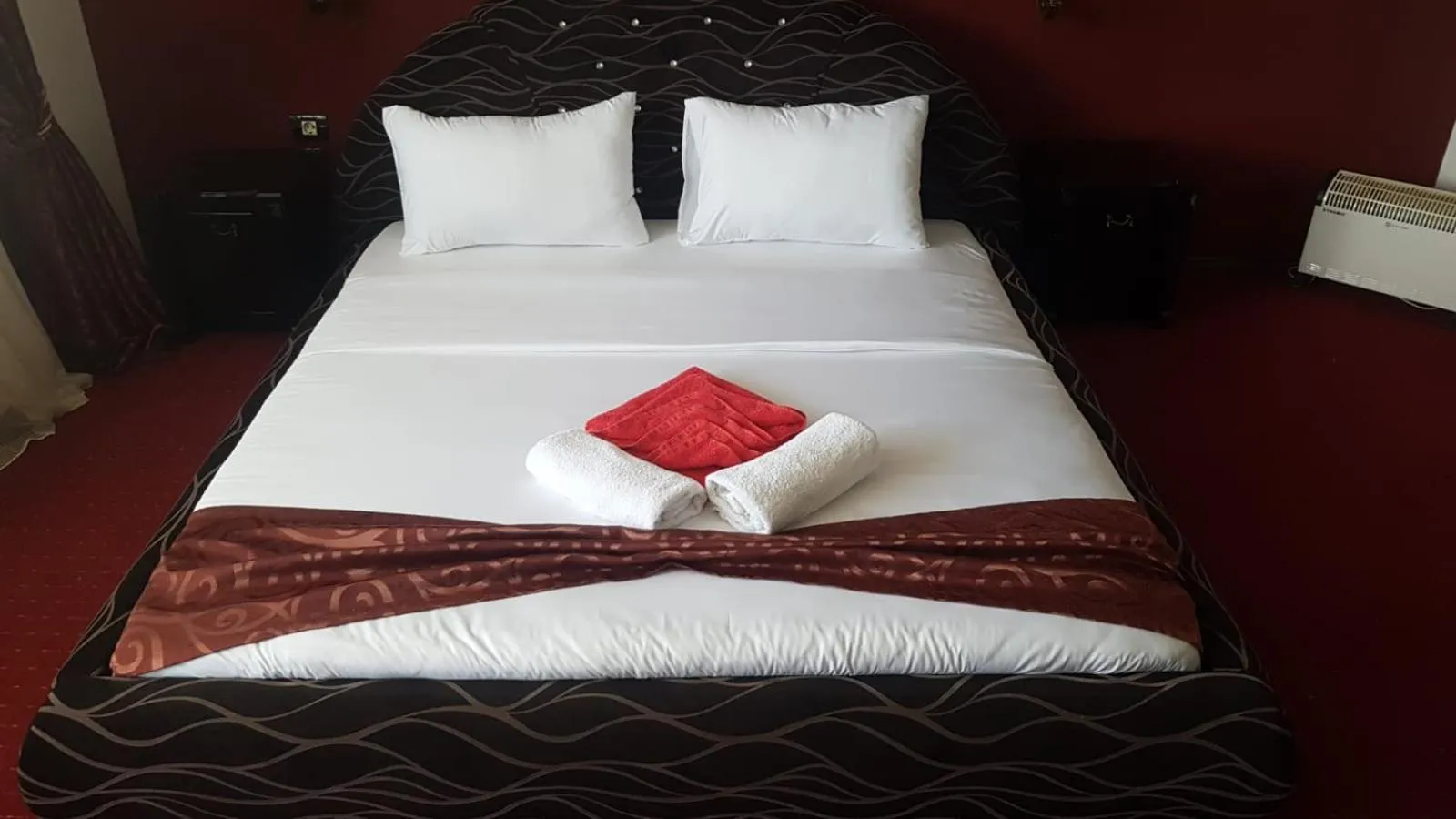 Bed in Rey Hotel