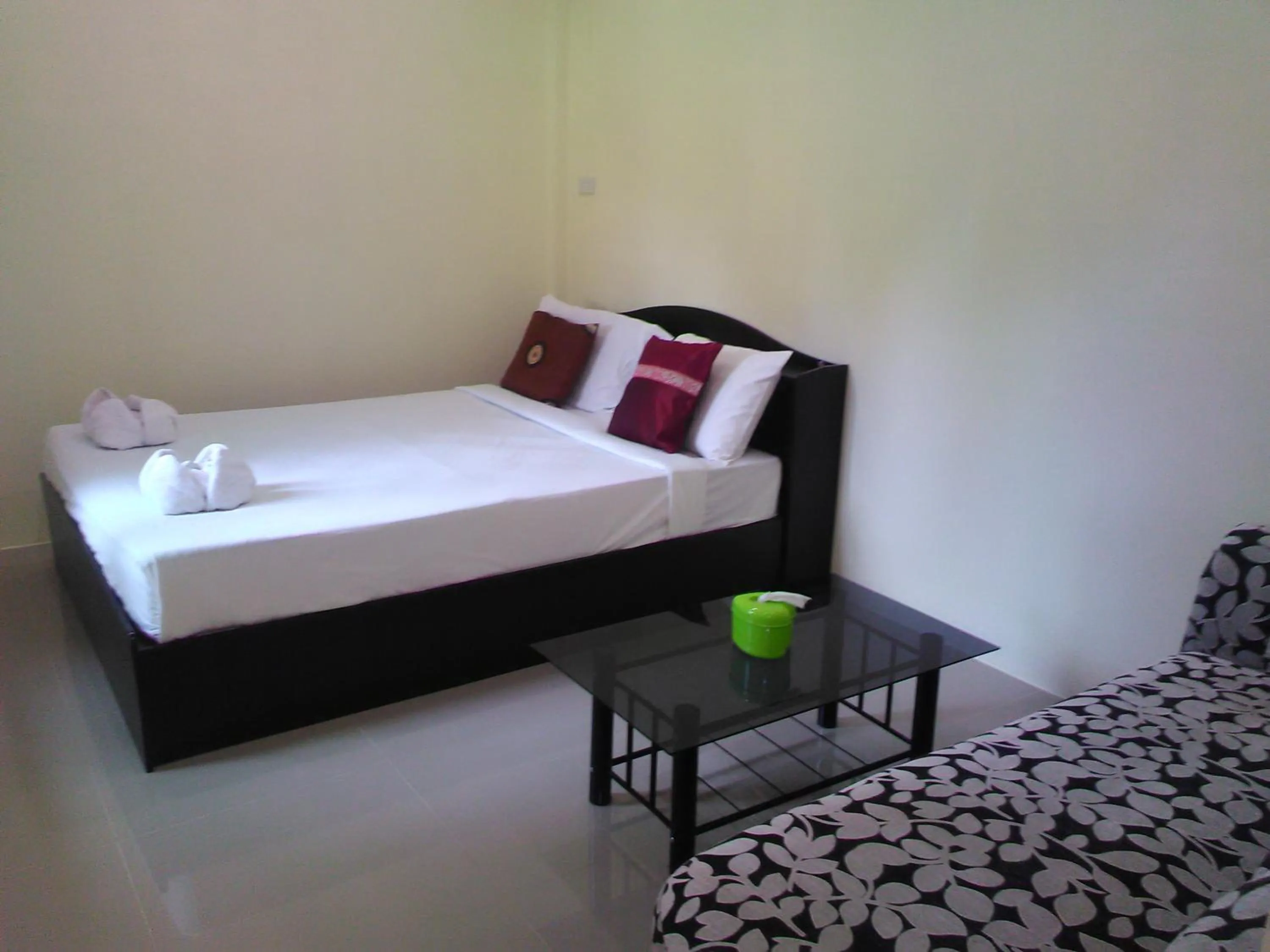 Bed in Khanom Garden Suite