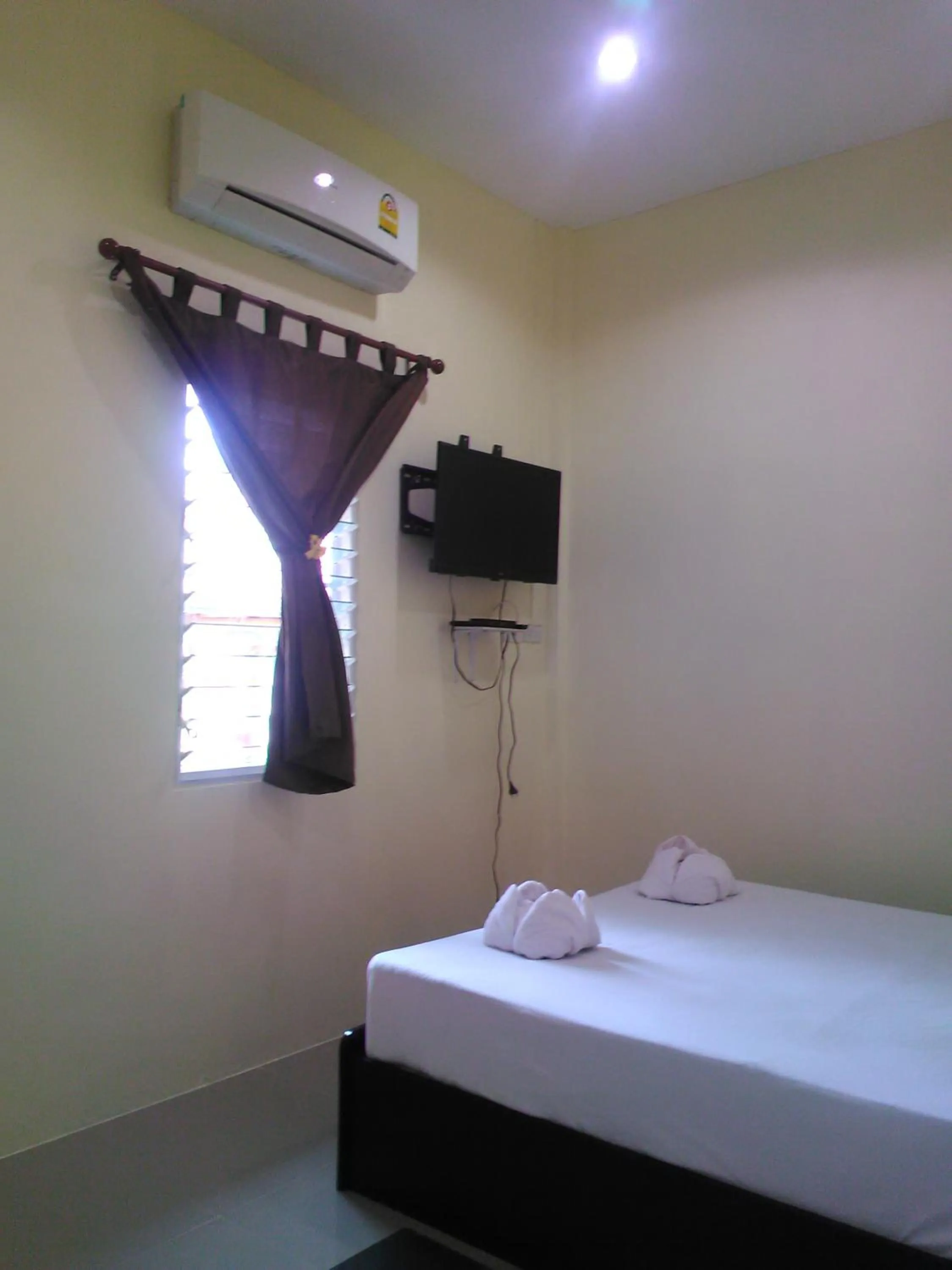 Bed in Khanom Garden Suite