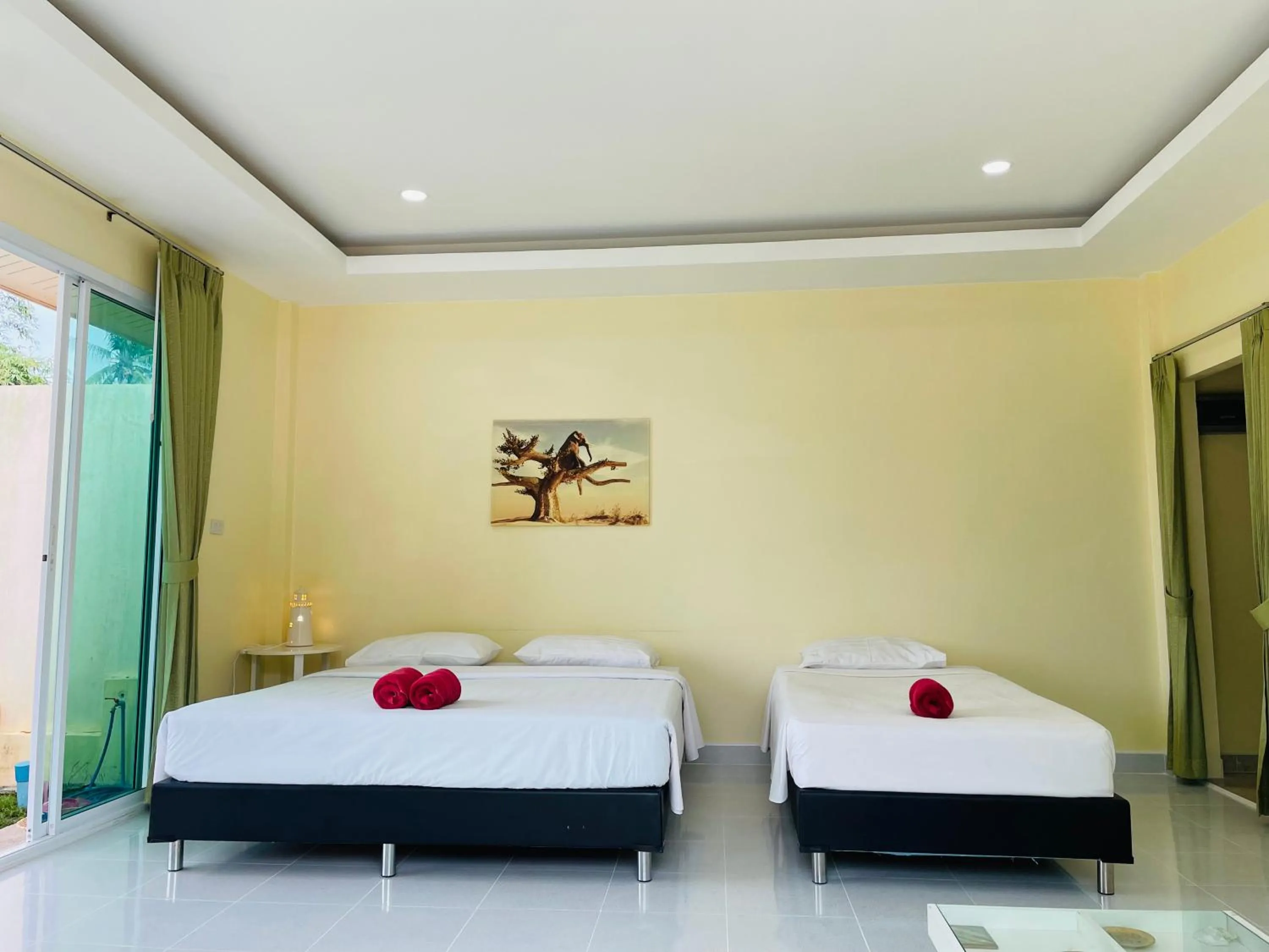 Bed in Khanom Garden Suite