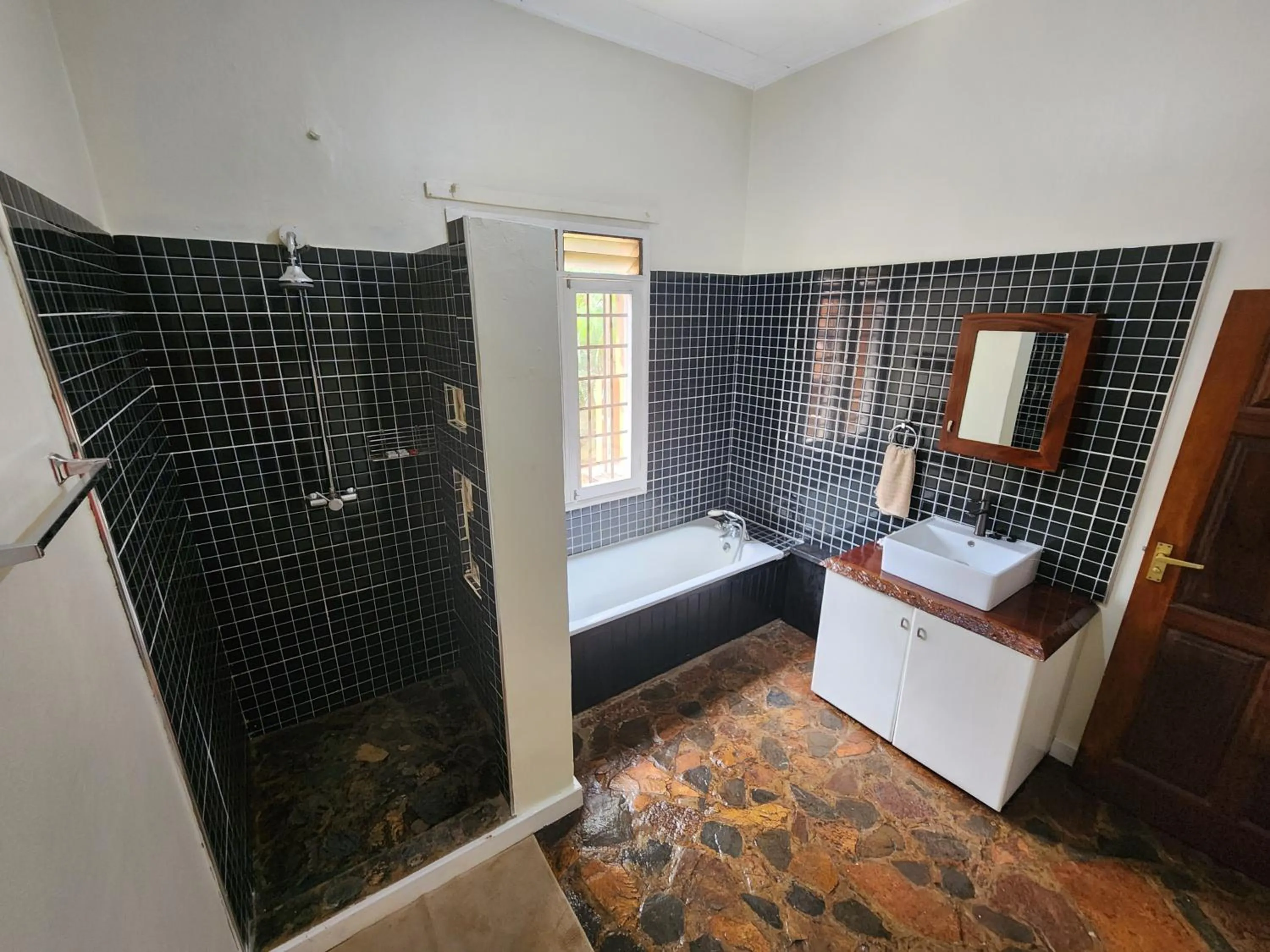 Bathroom, Bed in Surjios Guest House