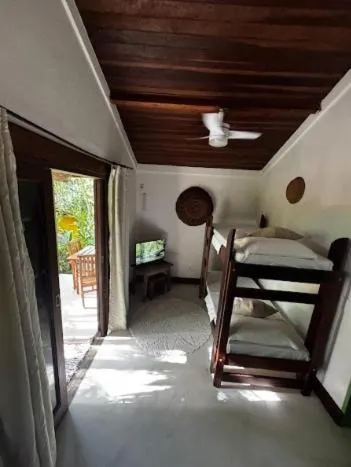 Bed in Pousada Bromélias