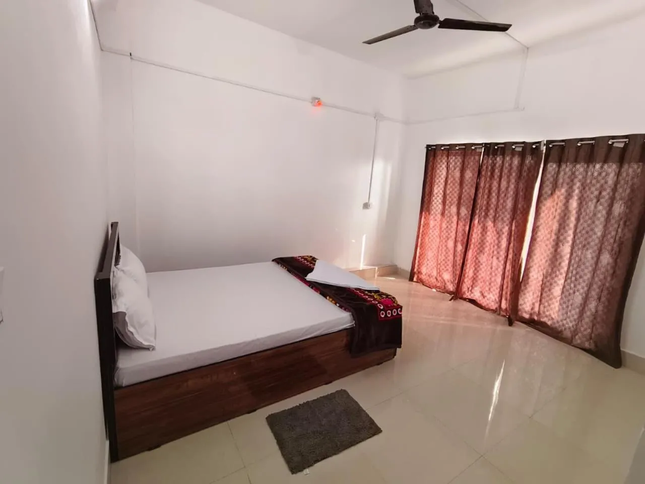 Bed in JIRONI RESIDENCY in