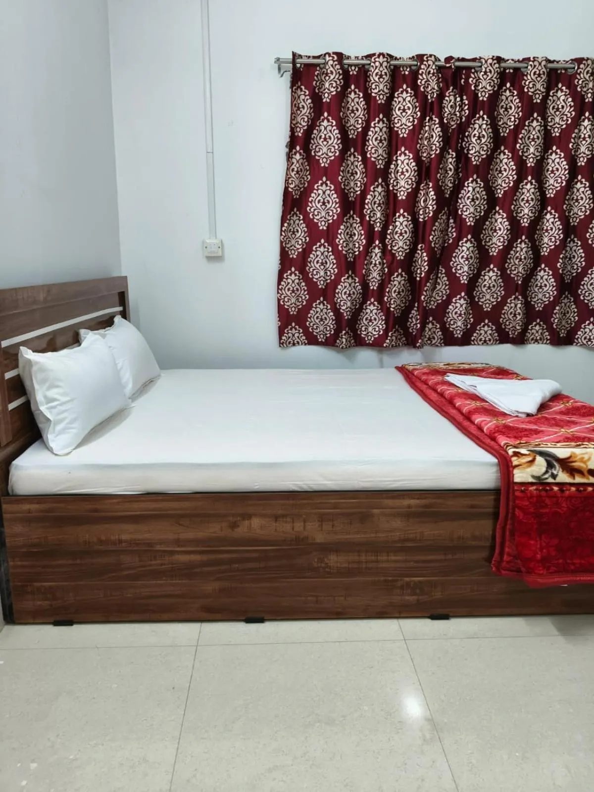 Bed in JIRONI RESIDENCY in