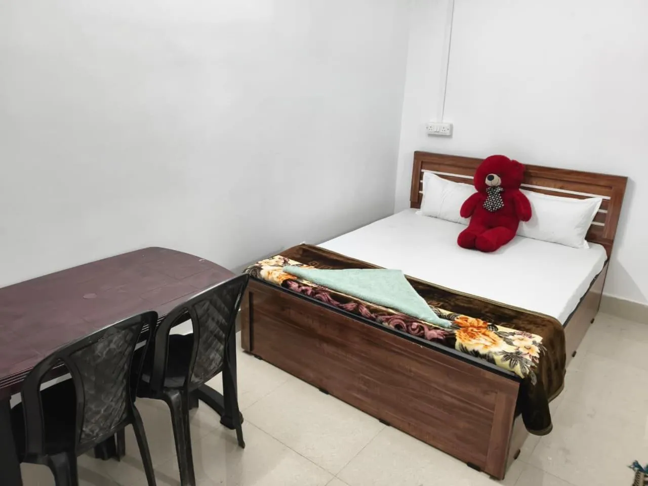 Bed in JIRONI RESIDENCY in