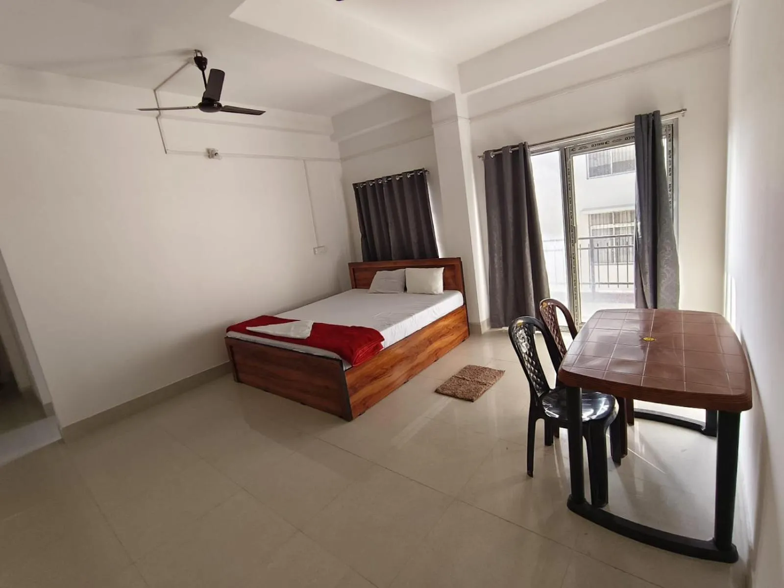 Bed in JIRONI RESIDENCY in