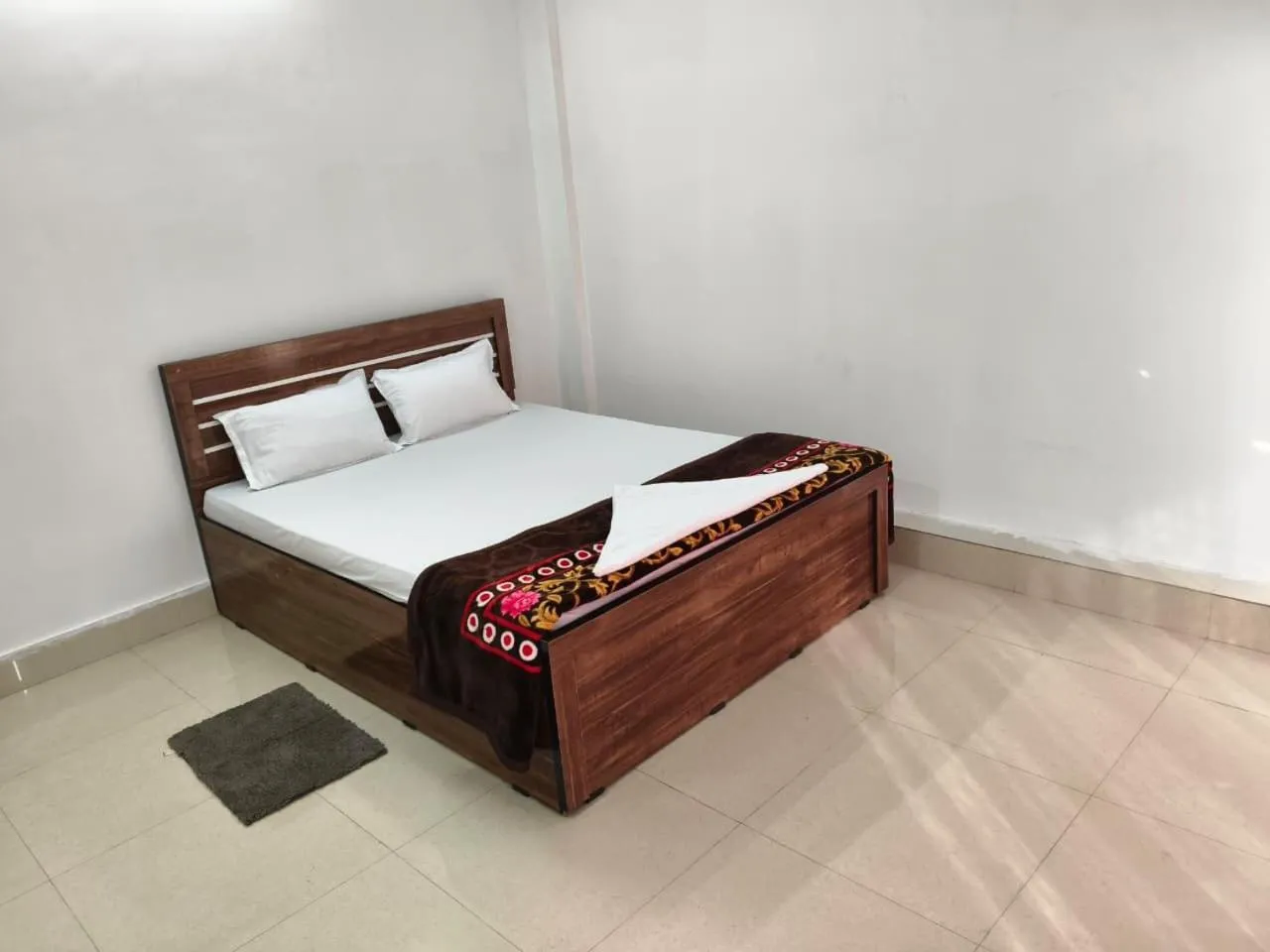 Bed in JIRONI RESIDENCY in