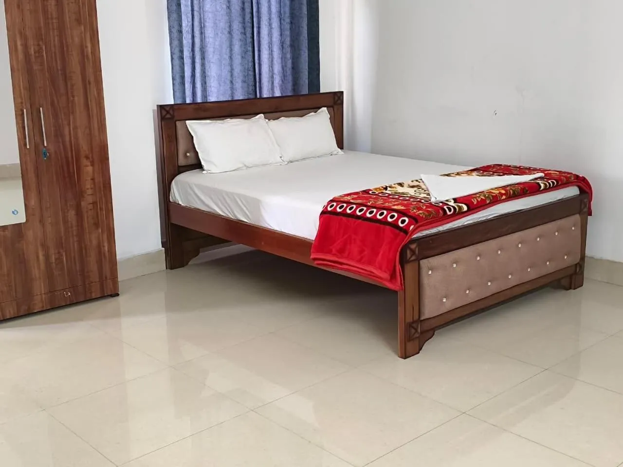 Bed in JIRONI RESIDENCY in