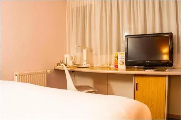 Bed in initial by balladins La Roche-sur-Yon Bed in initial by balladins La Roche-sur-Yon