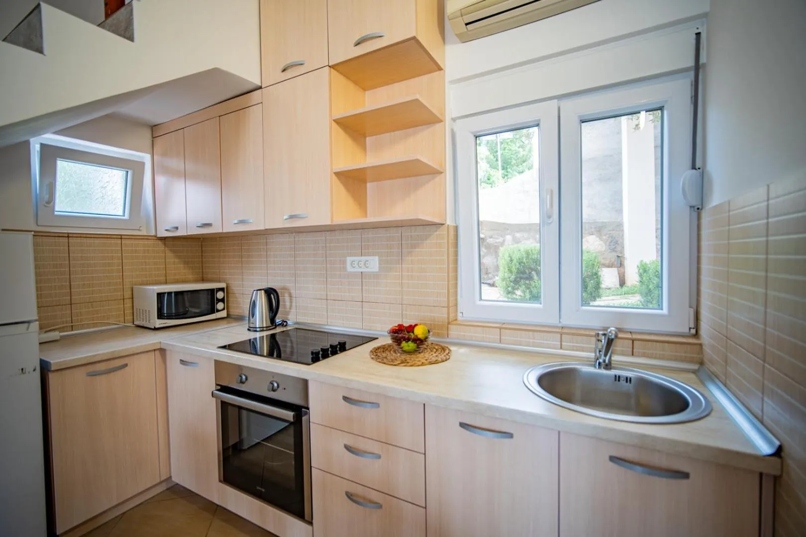 Kitchen or kitchenette in Apartments Novo Mulo