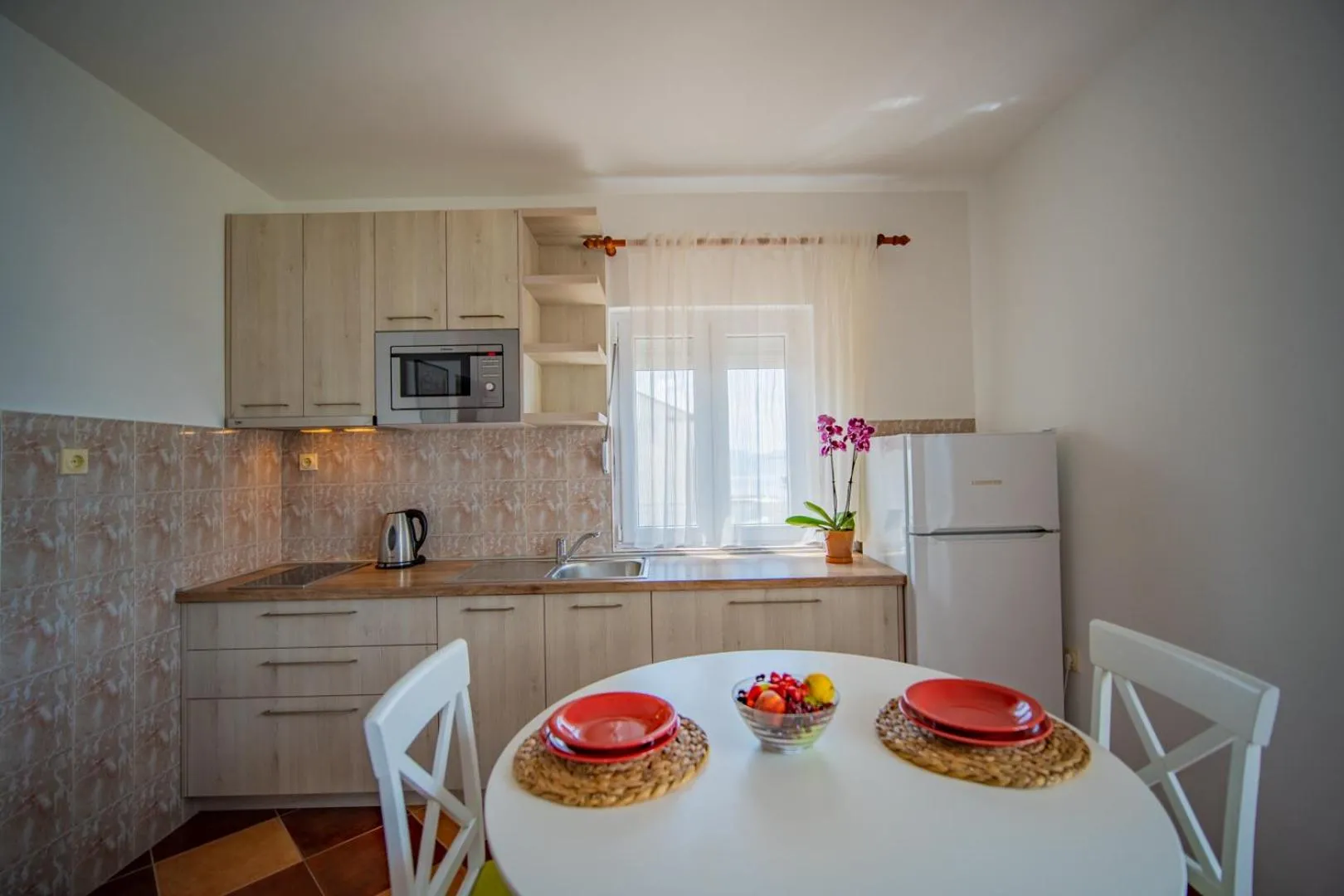 Kitchen or kitchenette in Apartments Novo Mulo