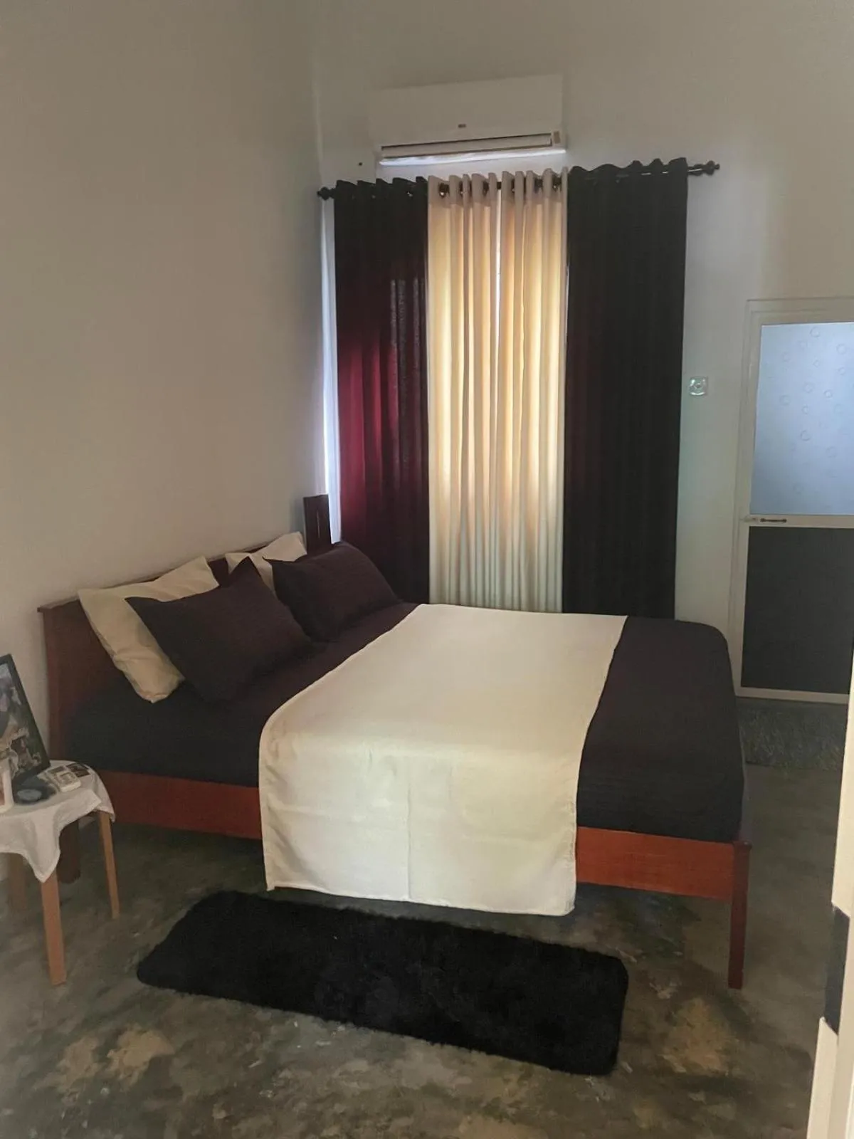 Bed in Villa Sri Beach Ayurveda Retreat