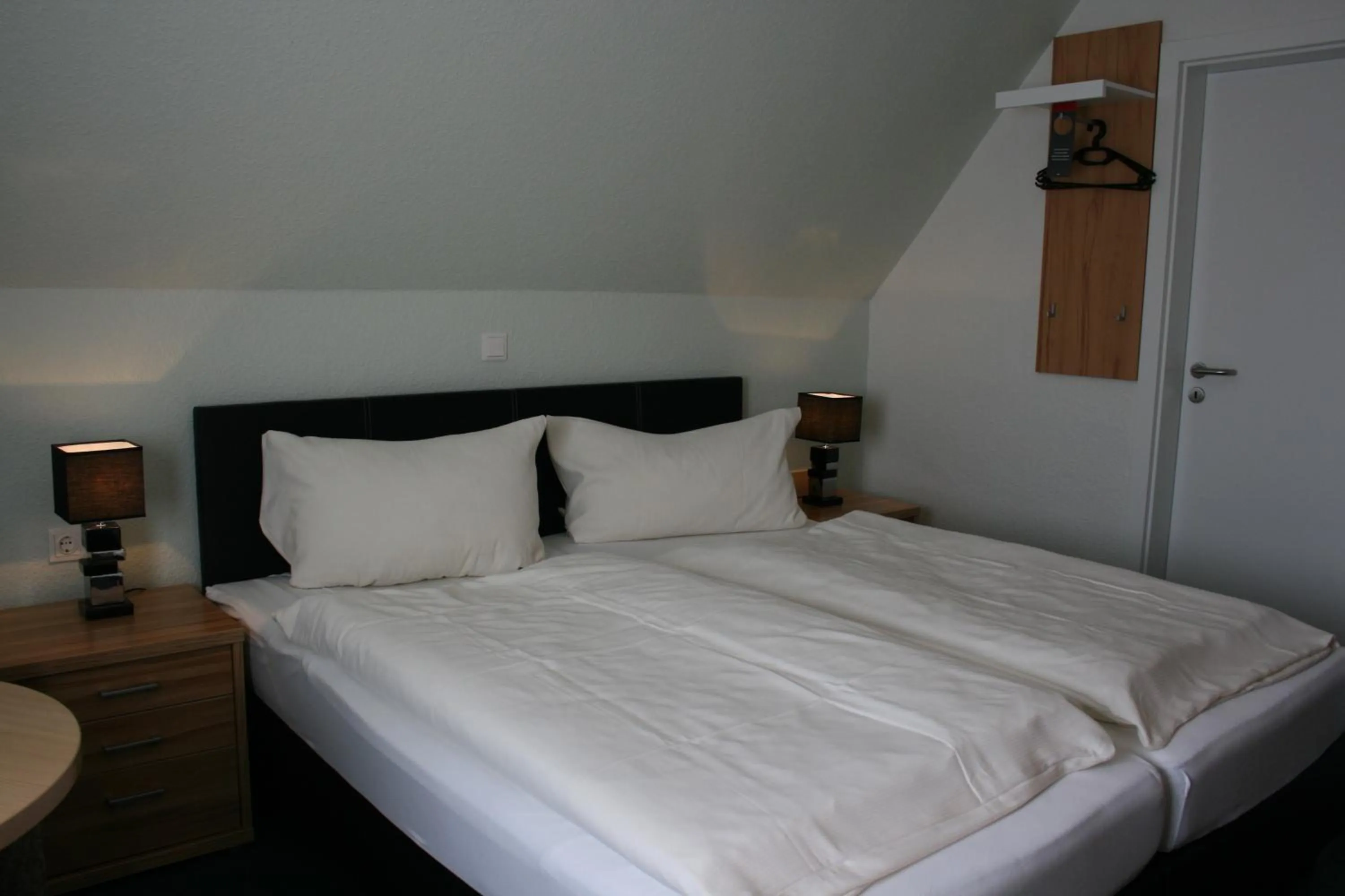 Bed in Hotel Haus Wittwer