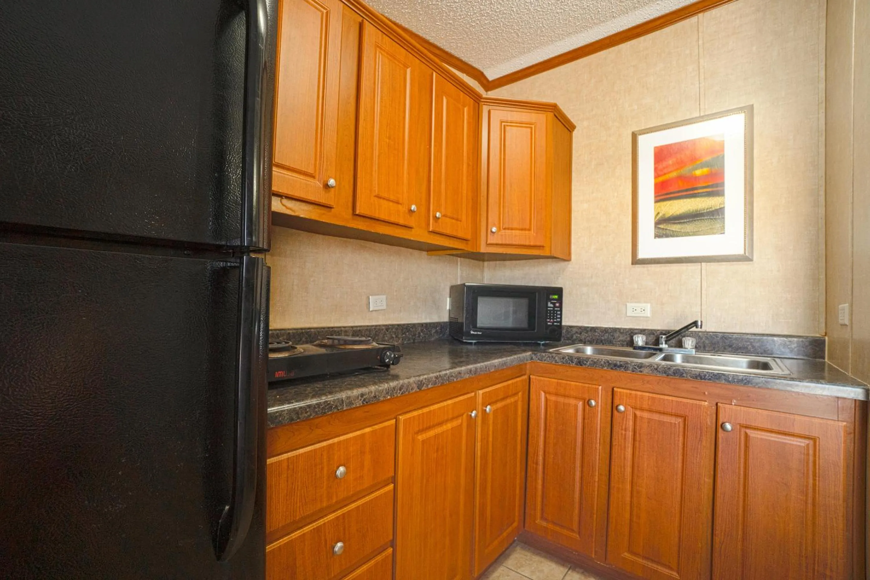 Kitchen or kitchenette in Grand Eagle Ford Lodge & RV Park