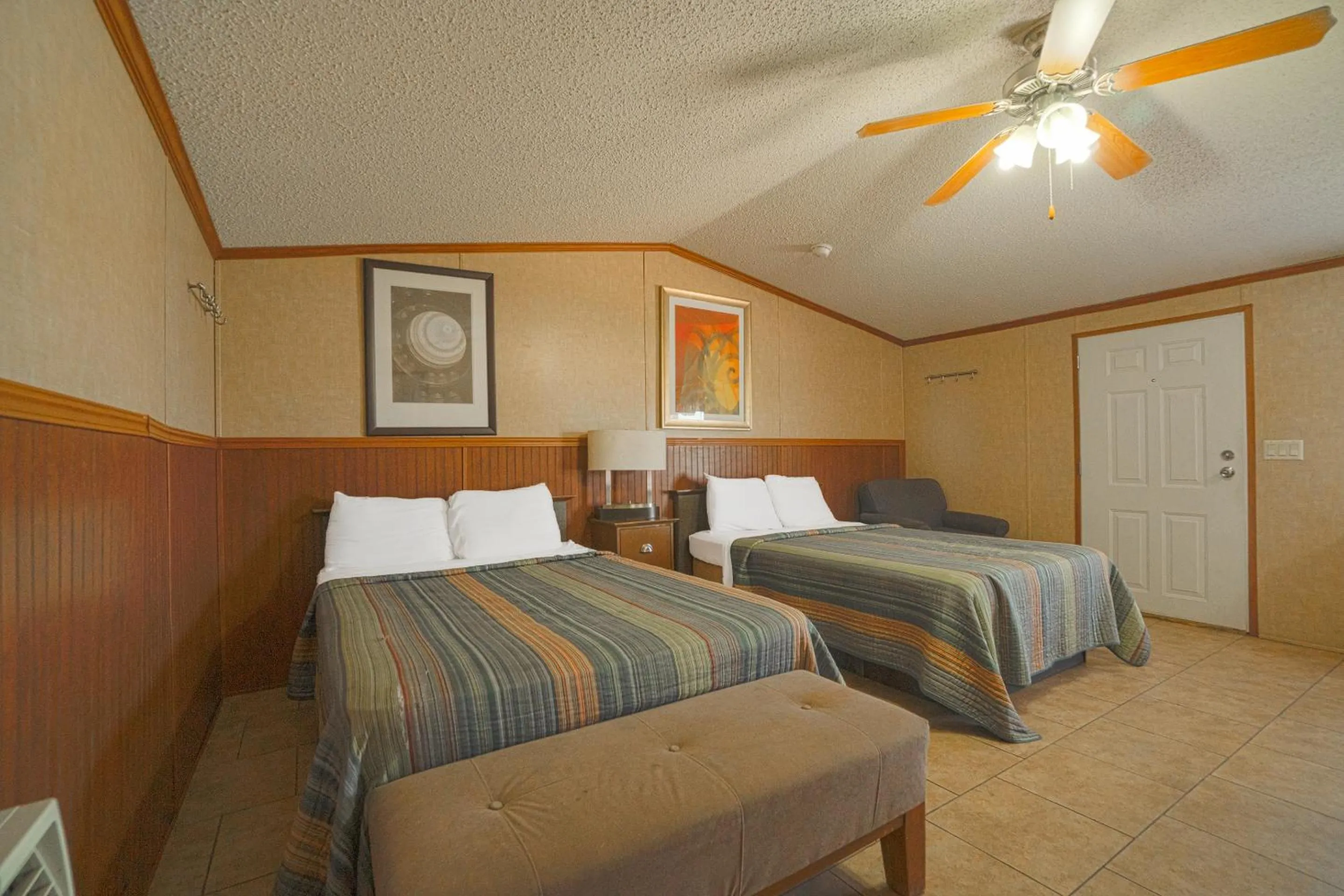 Bedroom in Grand Eagle Ford Lodge & RV Park