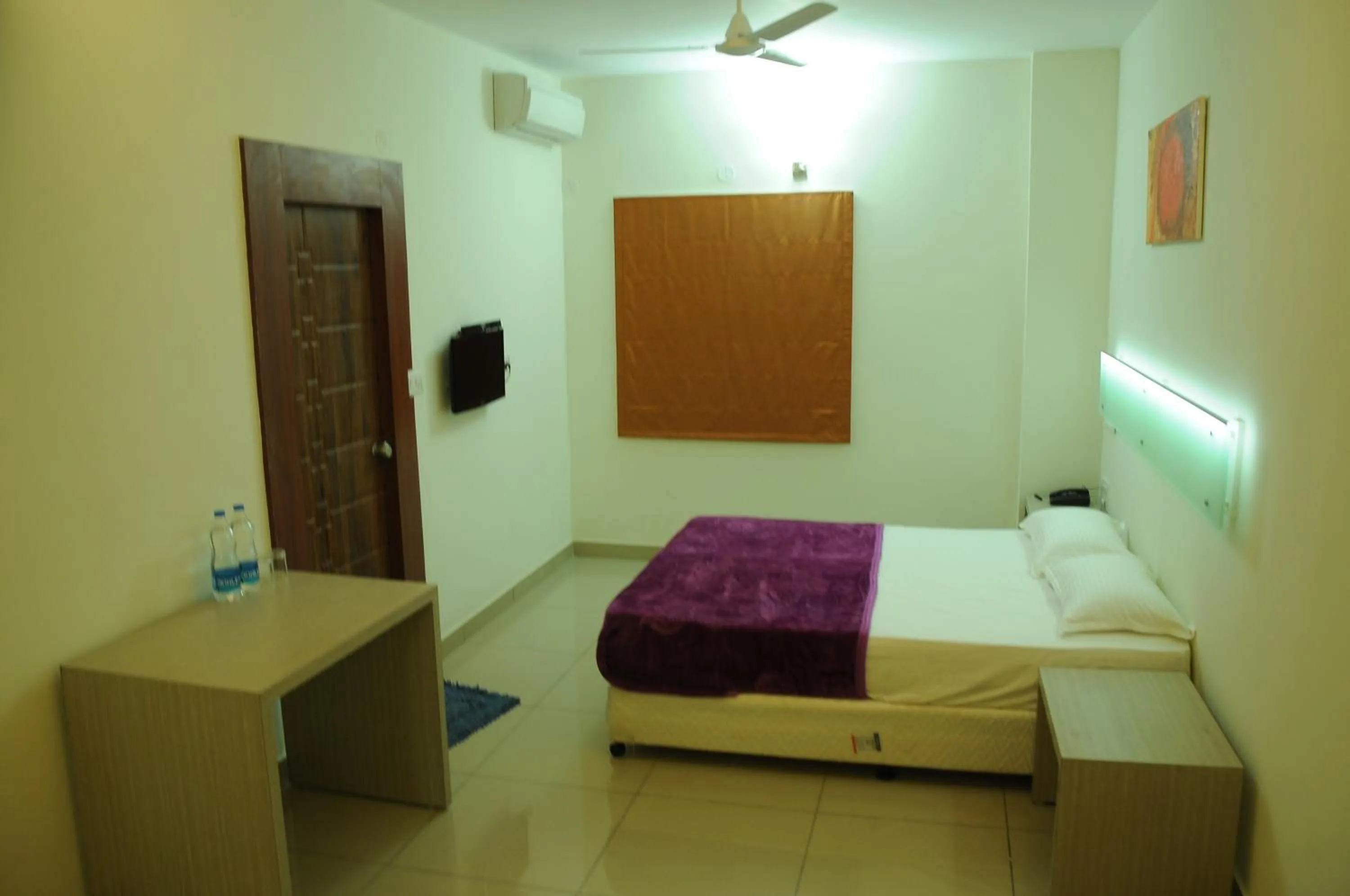 Bed in Cinnamon Residency