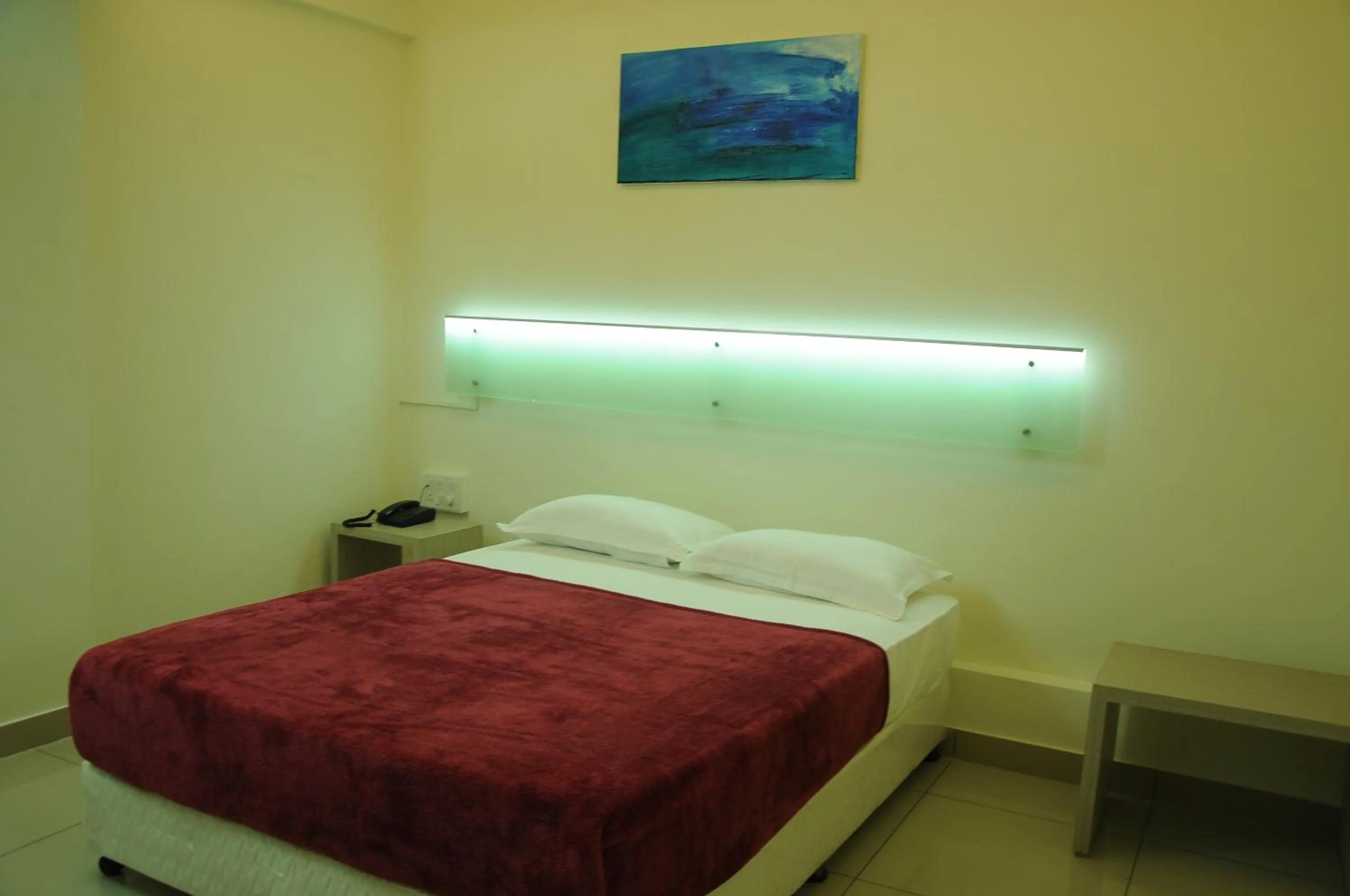 Bedroom in Cinnamon Residency