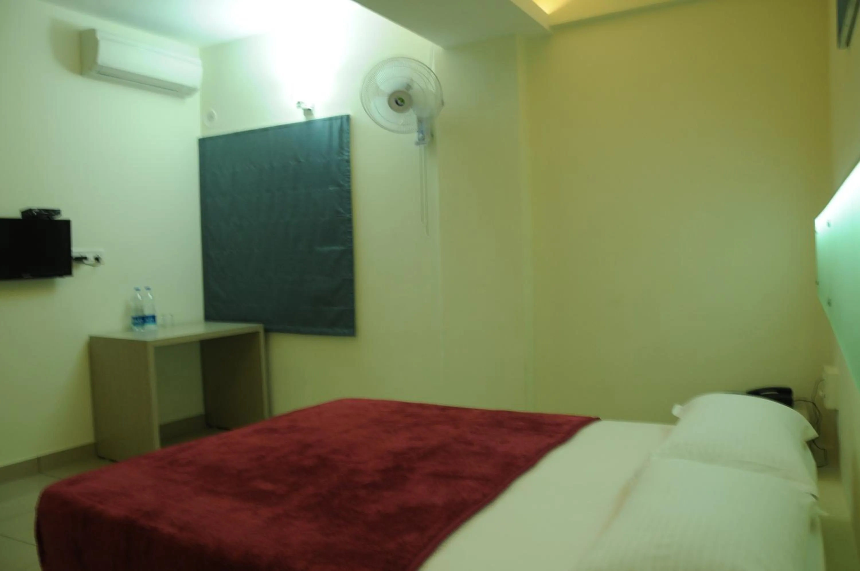 Bed in Cinnamon Residency