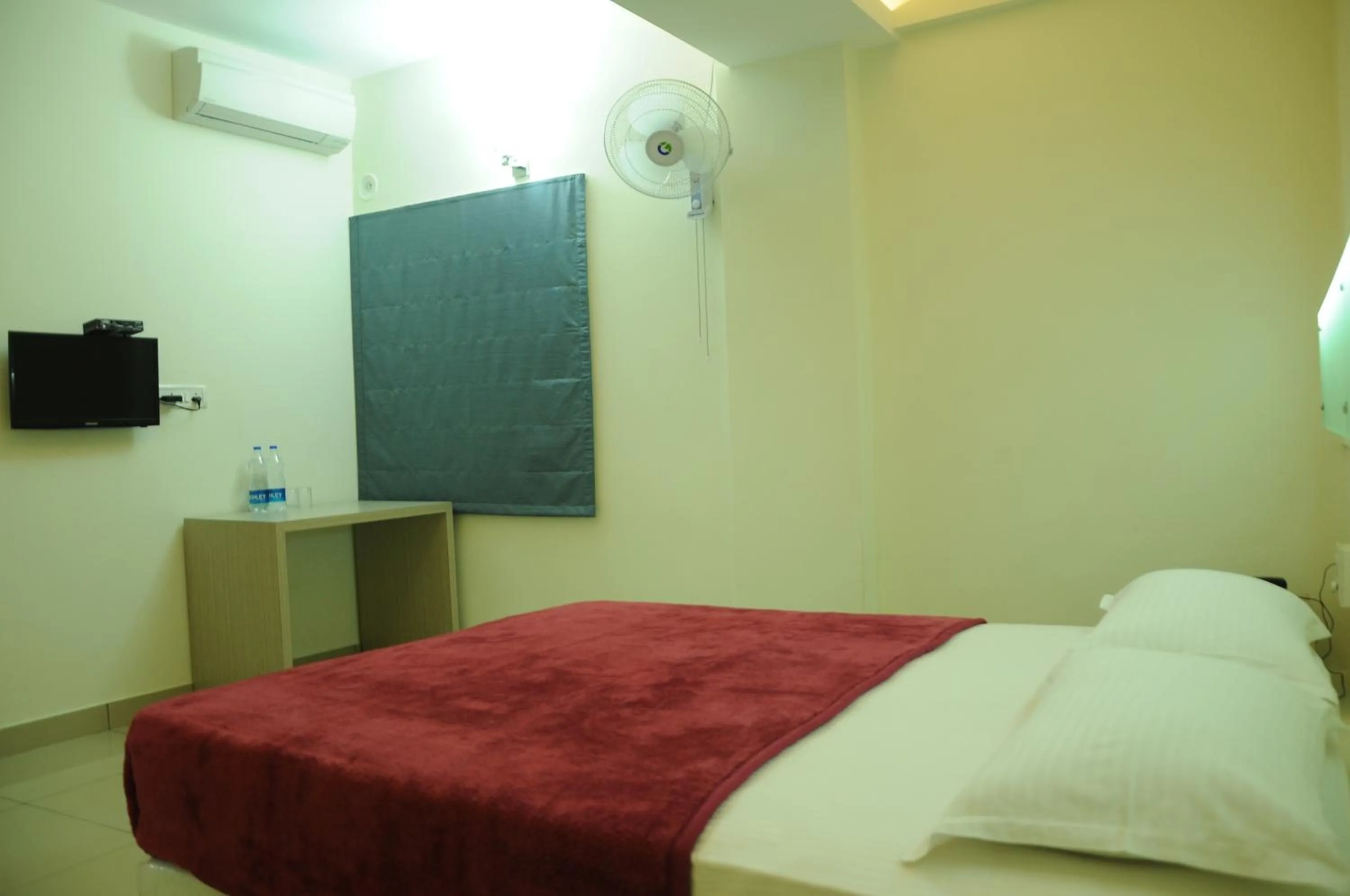 Bed in Cinnamon Residency