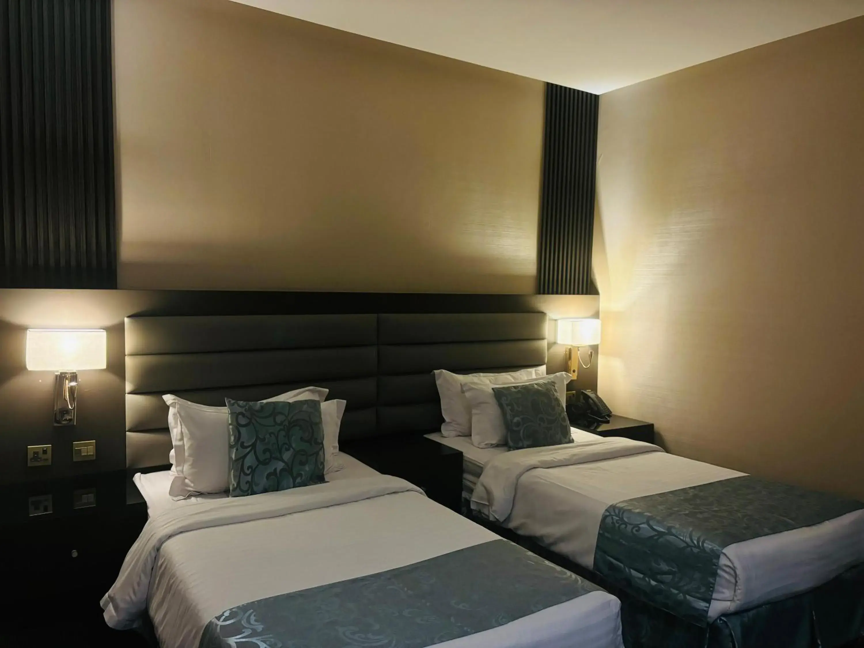 Bed in Sama Inn Hotel Bed in Sama Inn Hotel