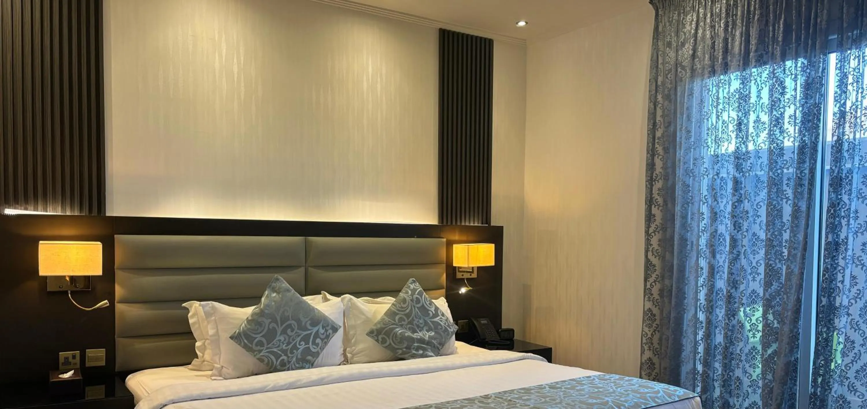 Bed in Sama Inn Hotel