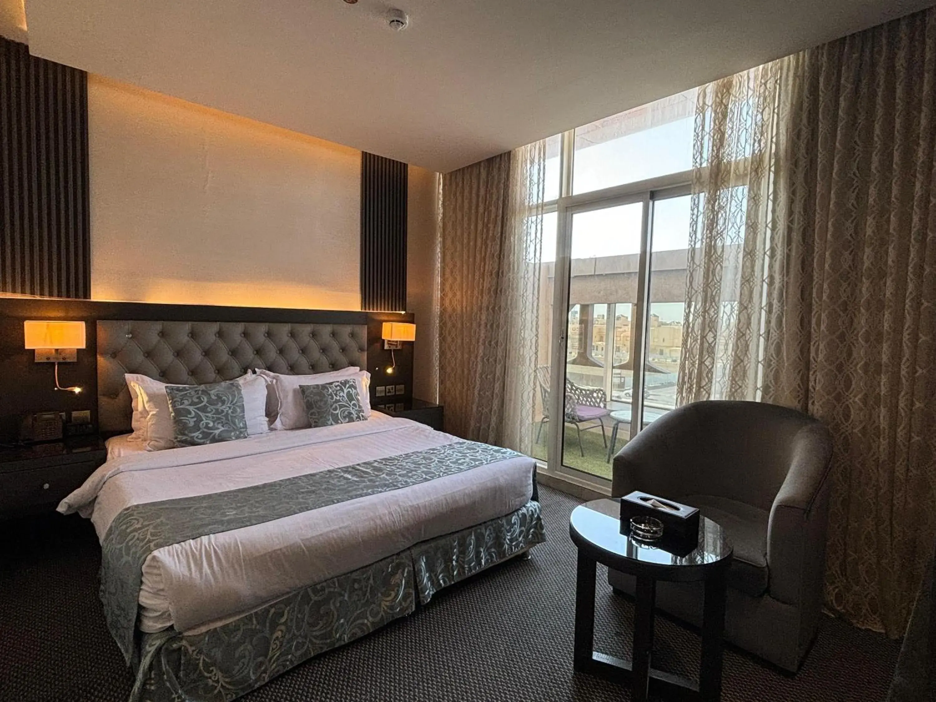 Bed in Sama Inn Hotel Bed in Sama Inn Hotel