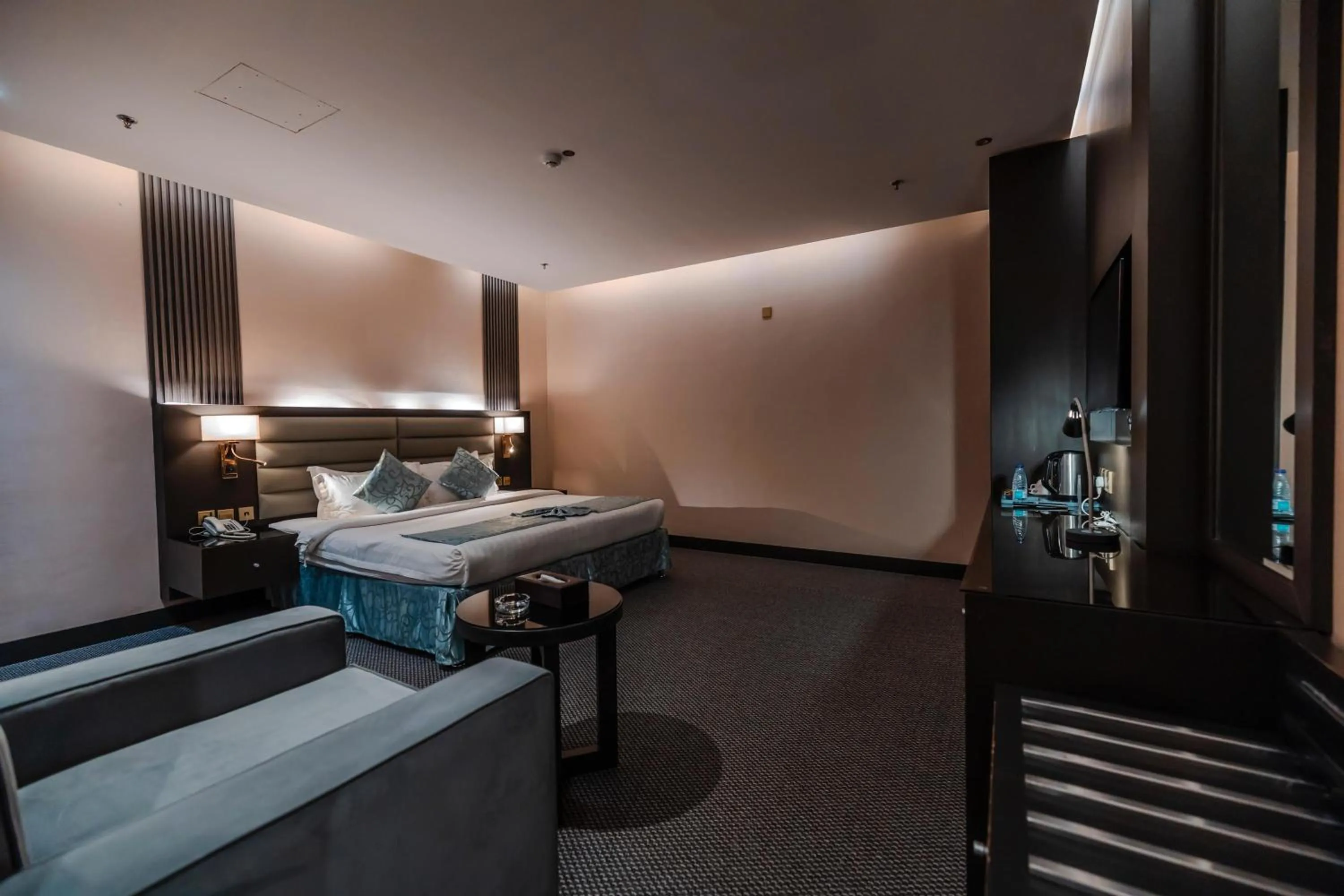 Bed in Sama Inn Hotel