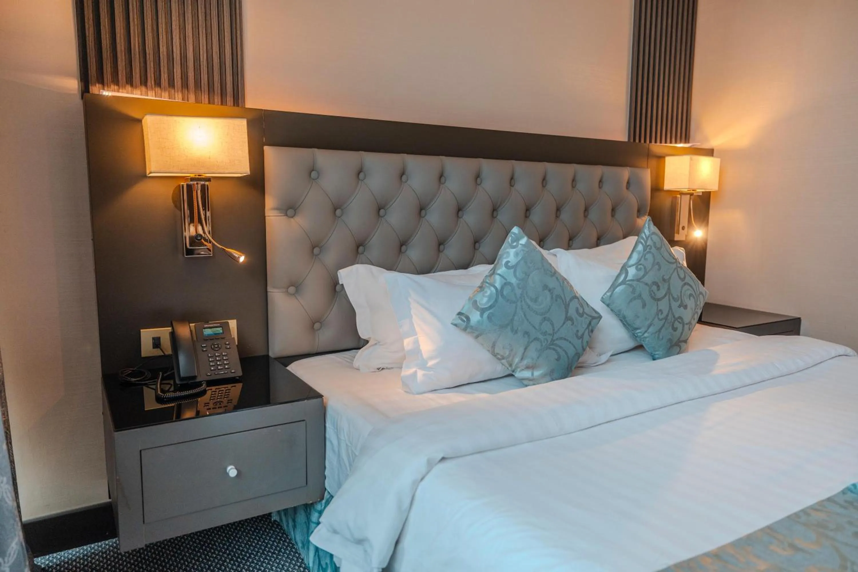 Bed in Sama Inn Hotel