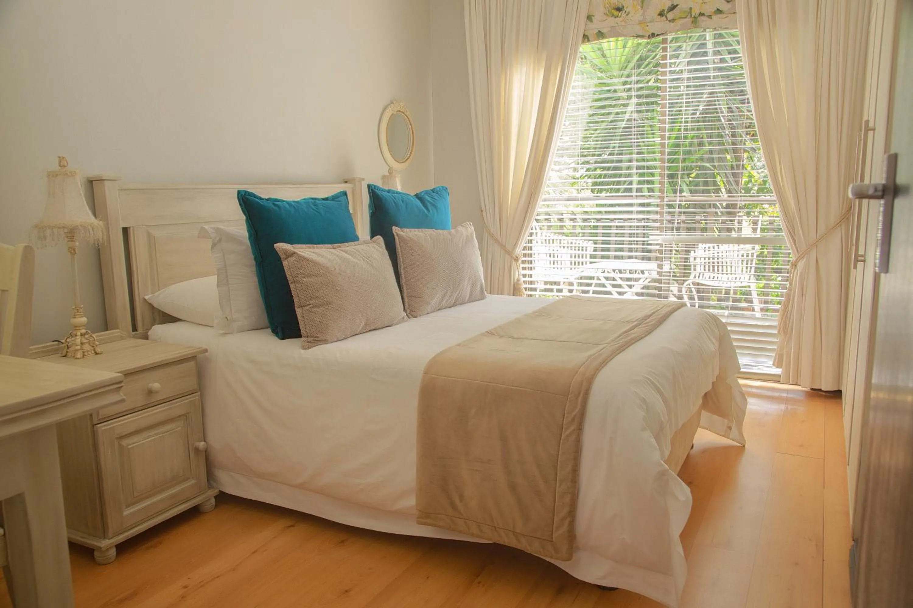 Bedroom in InnJoy Boutique Hotel