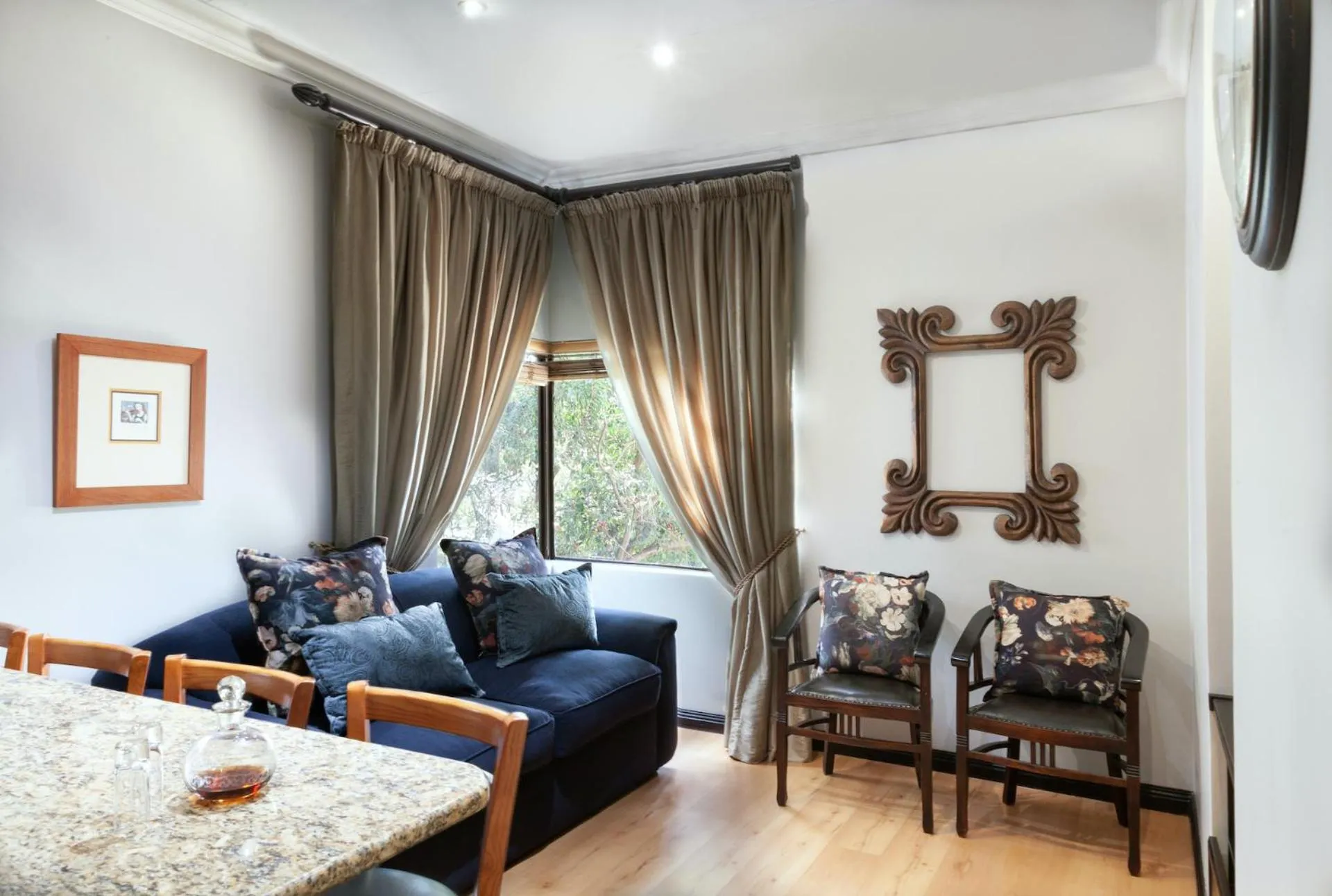 Seating area in InnJoy Boutique Hotel