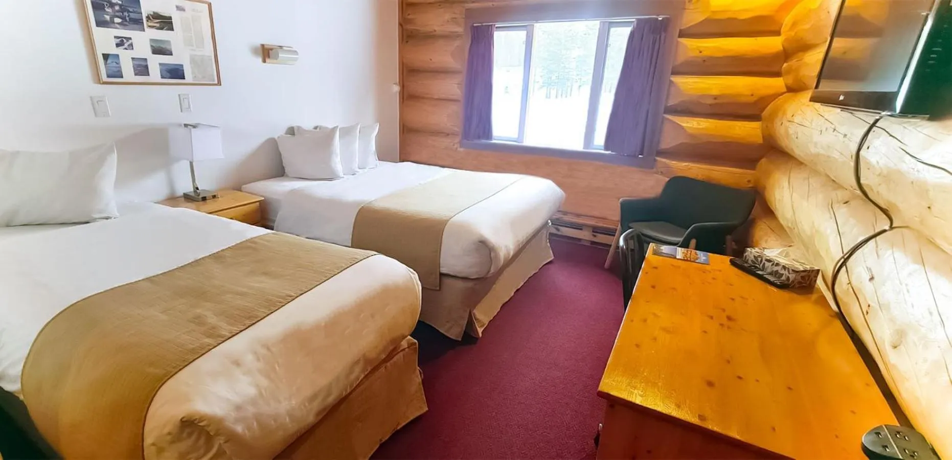 Bed in Northern Rockies Lodge